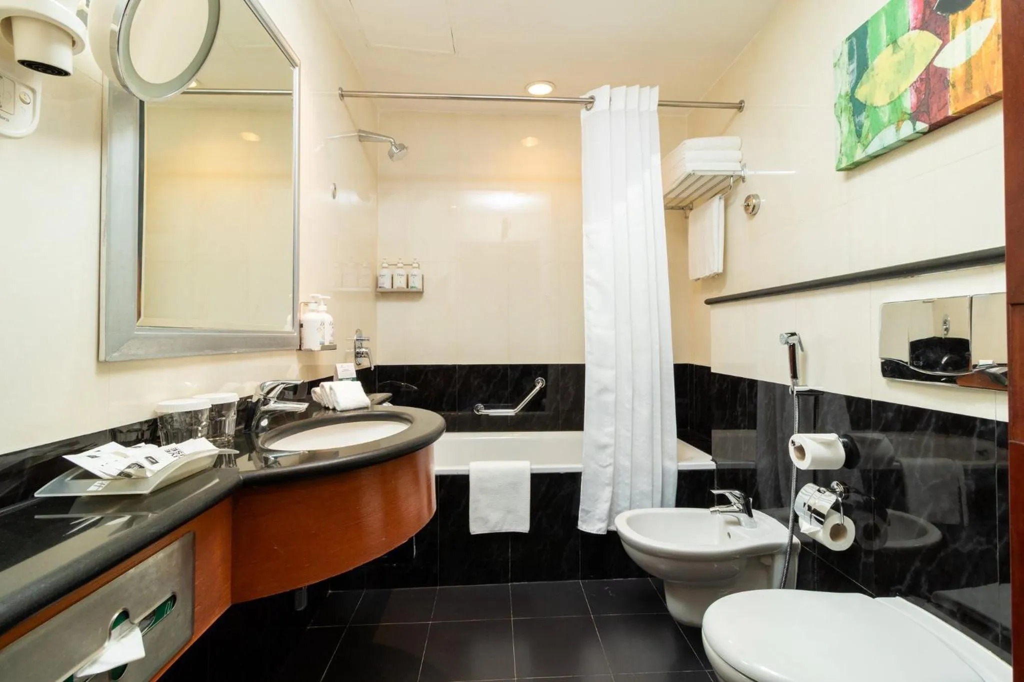 Bathroom in Holiday Inn - Suites Kuwait Salmiya by IHG