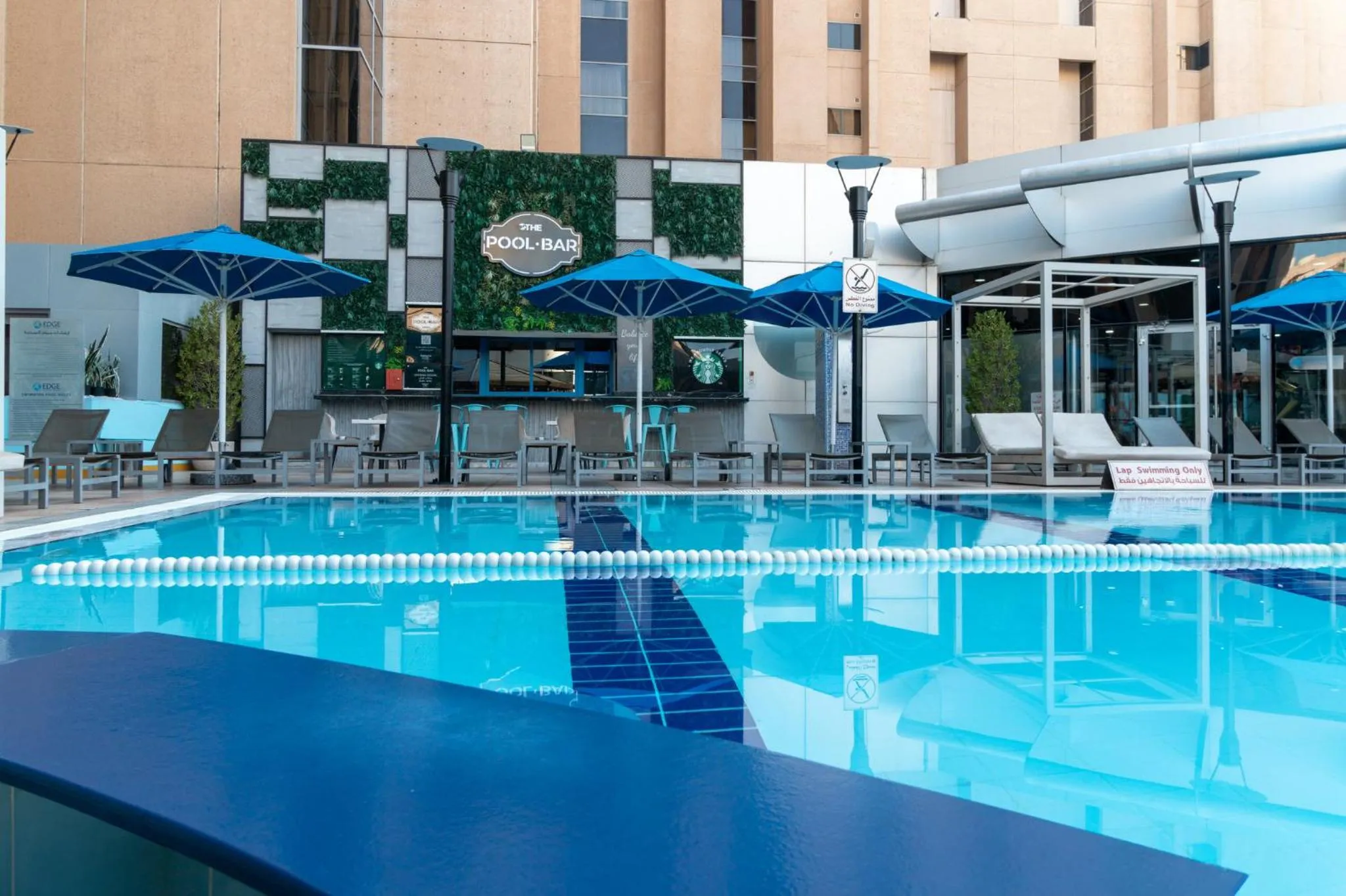 Swimming pool in Holiday Inn - Suites Kuwait Salmiya by IHG