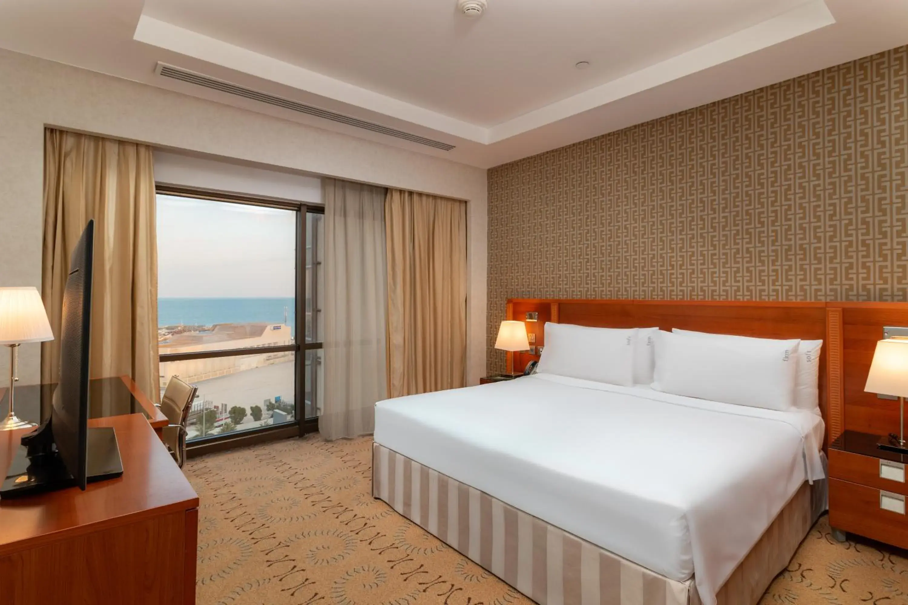 Bedroom, Bed in Holiday Inn - Suites Kuwait Salmiya by IHG Bedroom, Bed in Holiday Inn - Suites Kuwait Salmiya by IHG