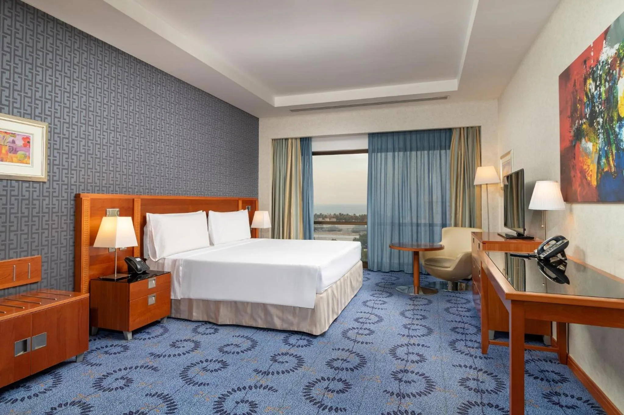 Photo of the whole room, Bed in Holiday Inn - Suites Kuwait Salmiya by IHG