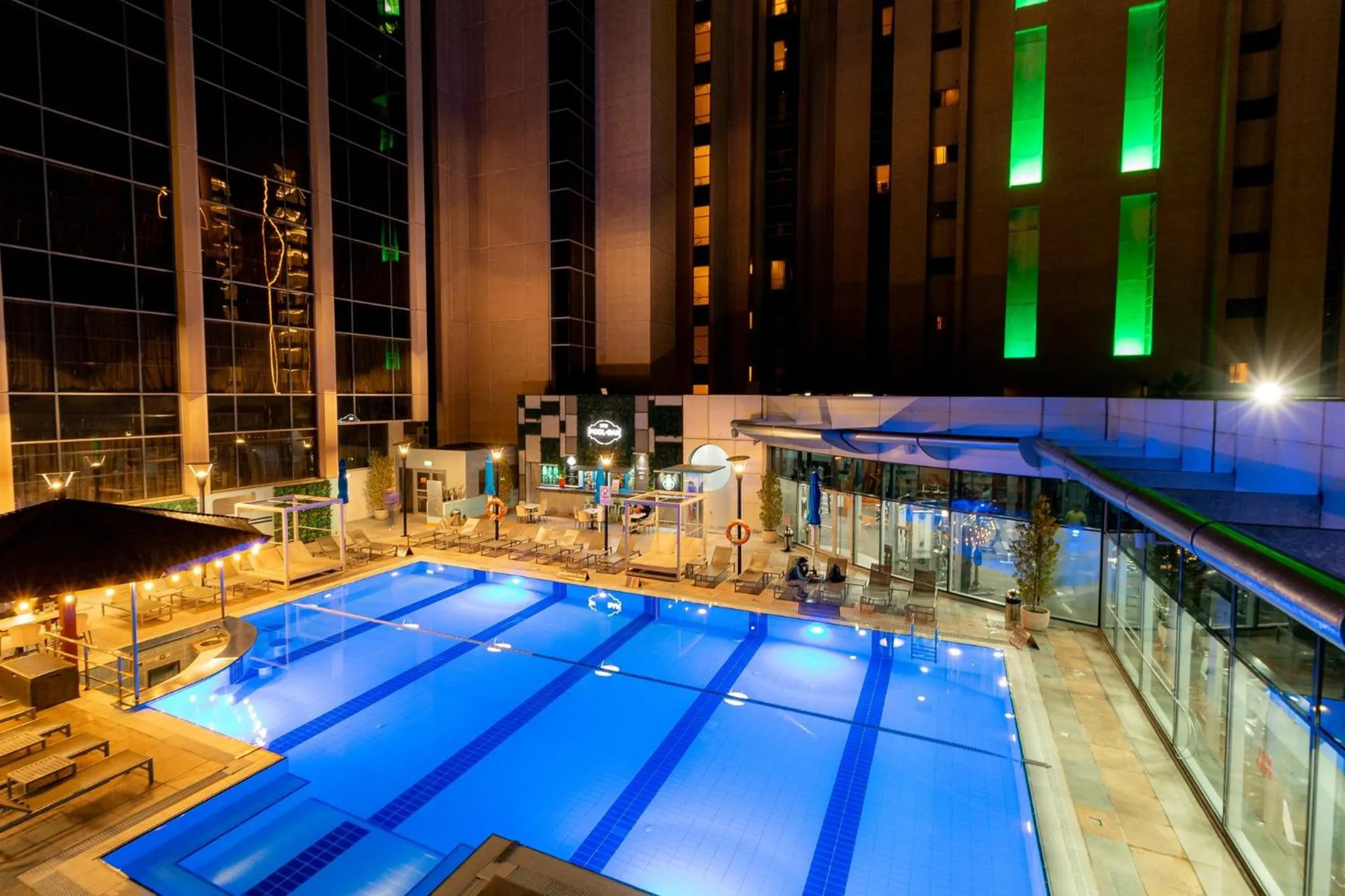 Swimming pool in Holiday Inn - Suites Kuwait Salmiya by IHG