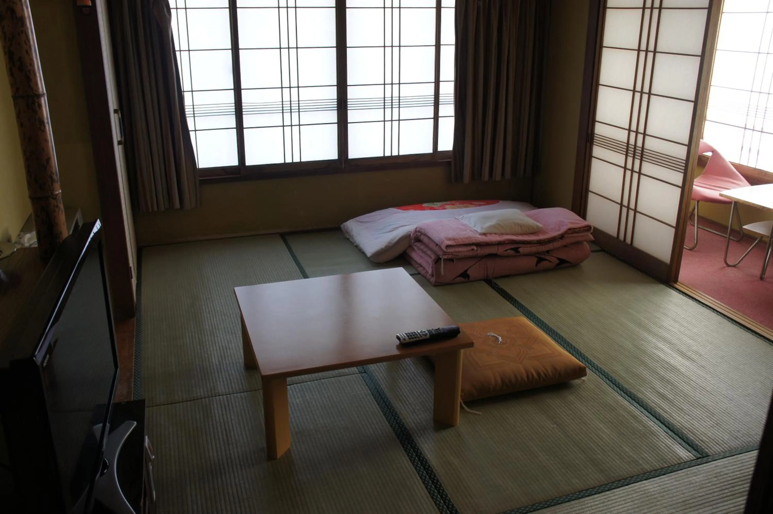 Photo of the whole room, Bed in Miyoshiya Ryokan