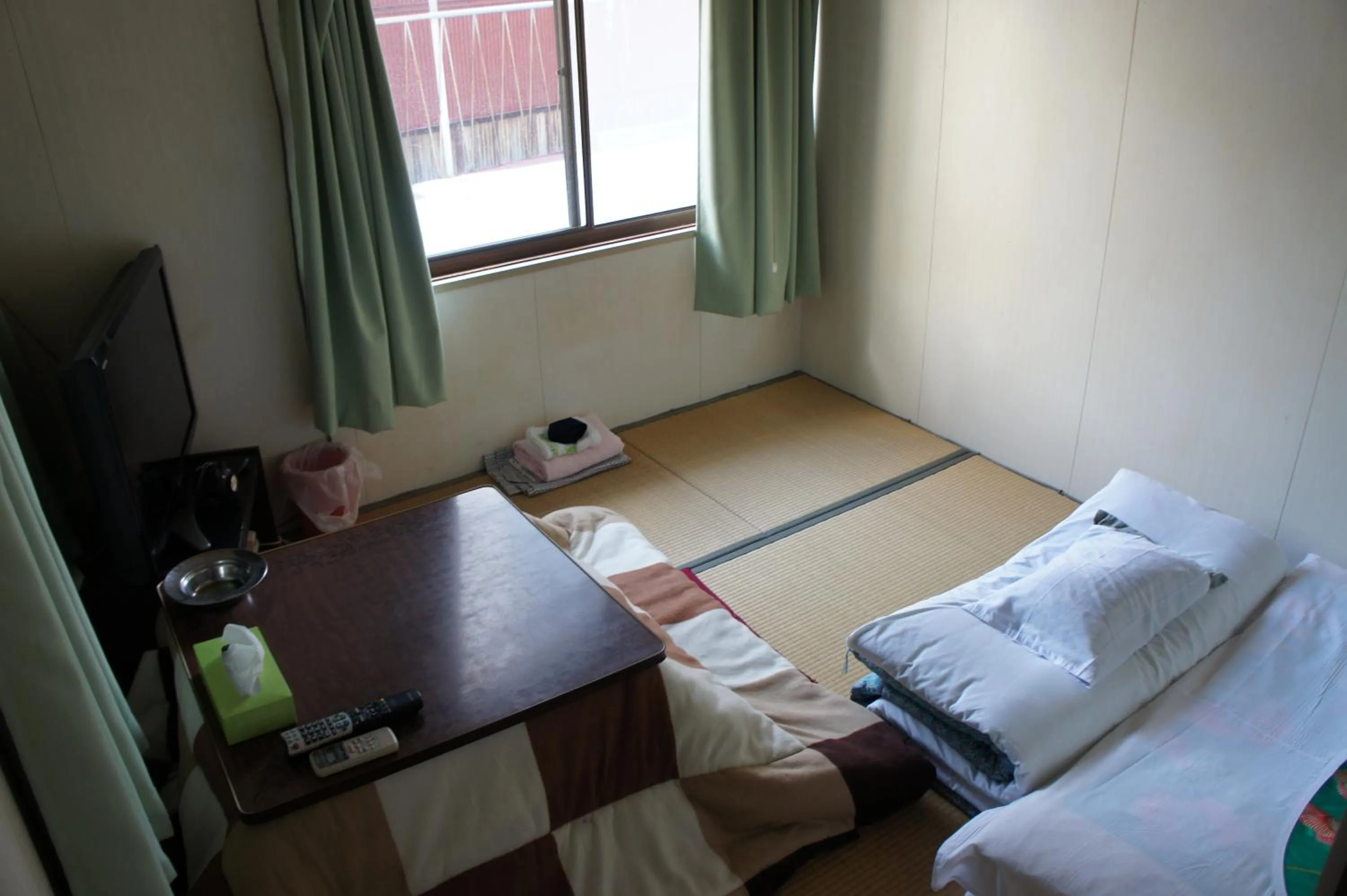 Photo of the whole room, Bed in Miyoshiya Ryokan