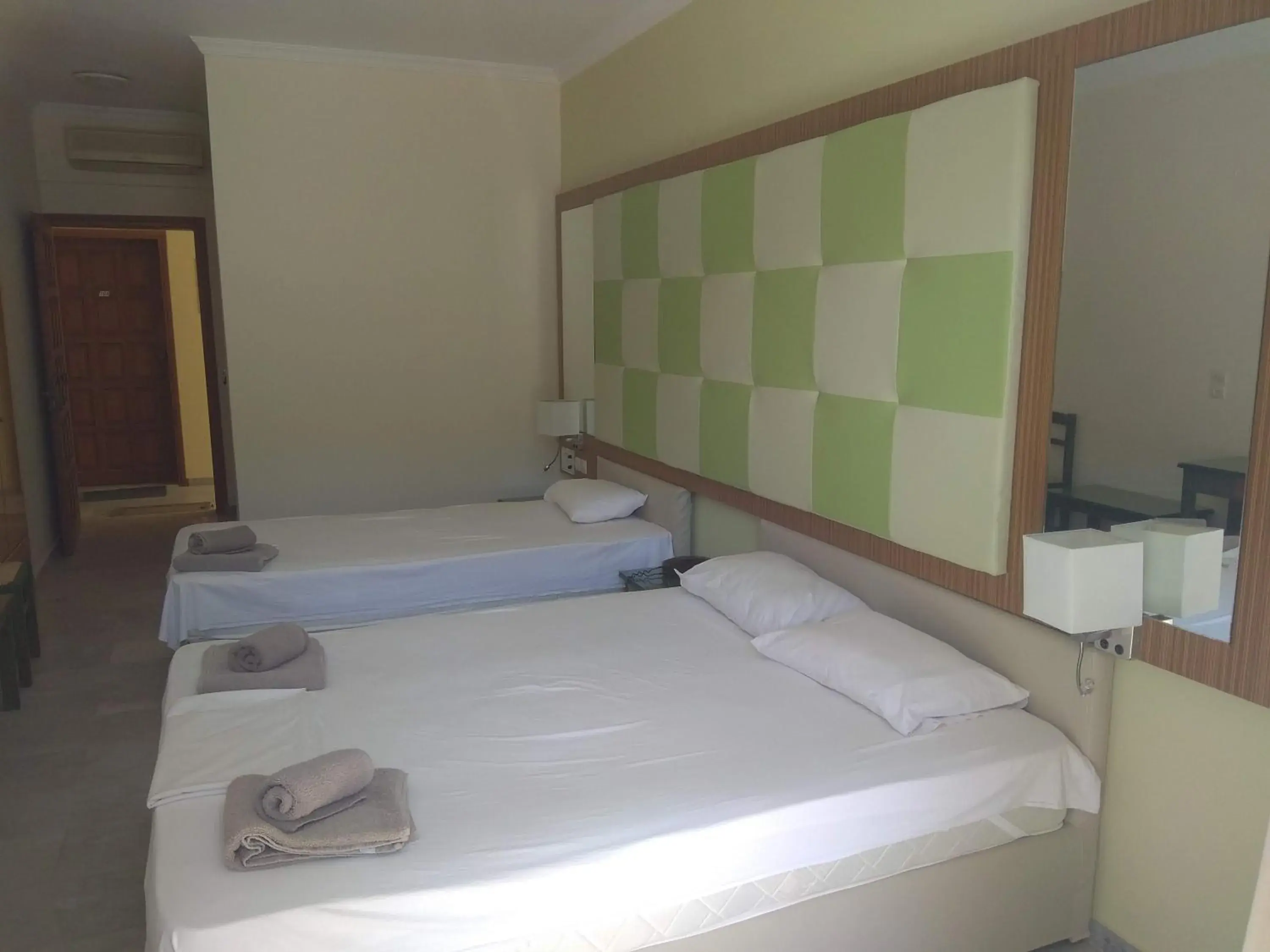 Bed in Kyriaki Hotel Bed in Kyriaki Hotel