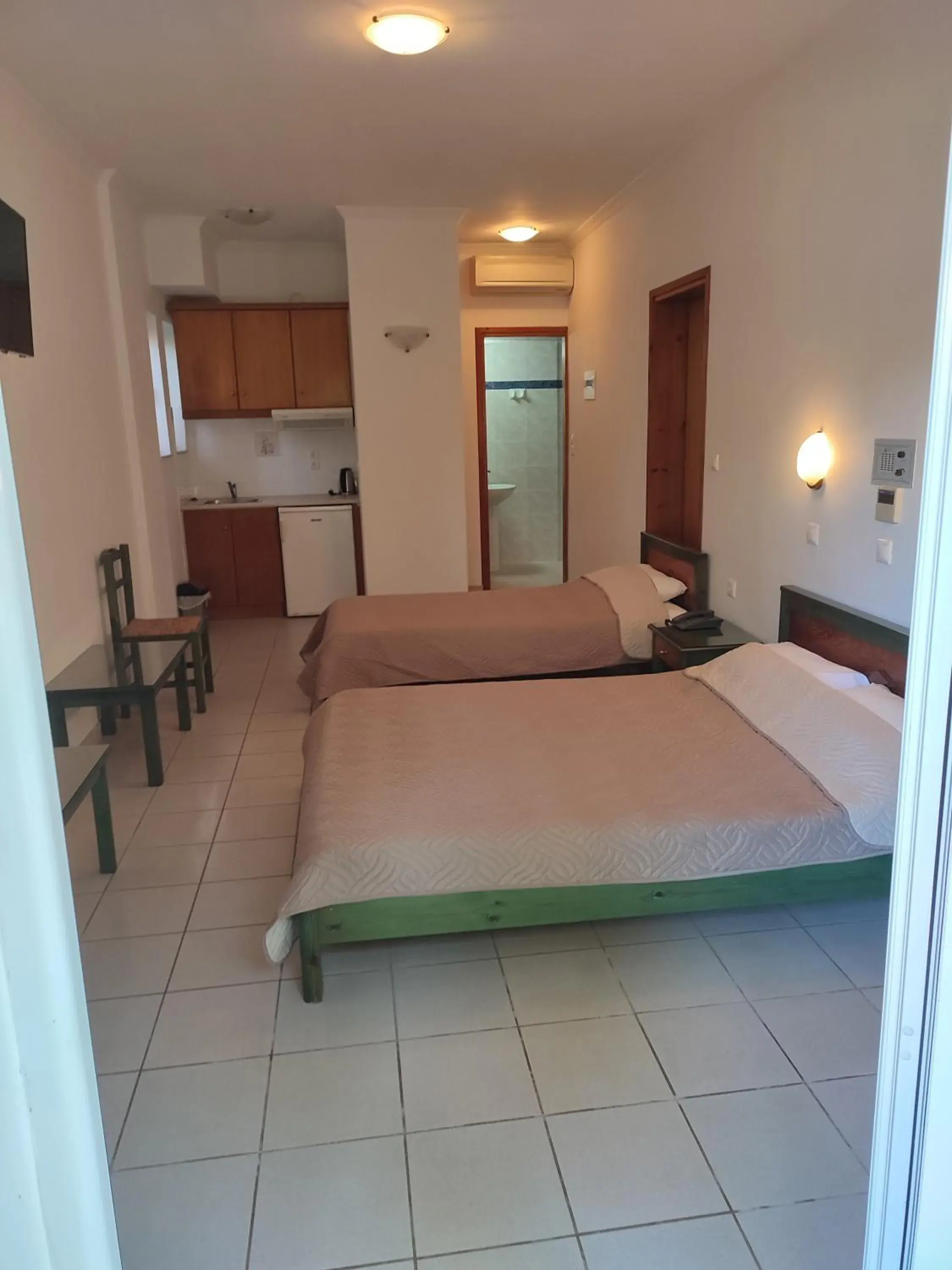 Bed in Kyriaki Hotel Bed in Kyriaki Hotel