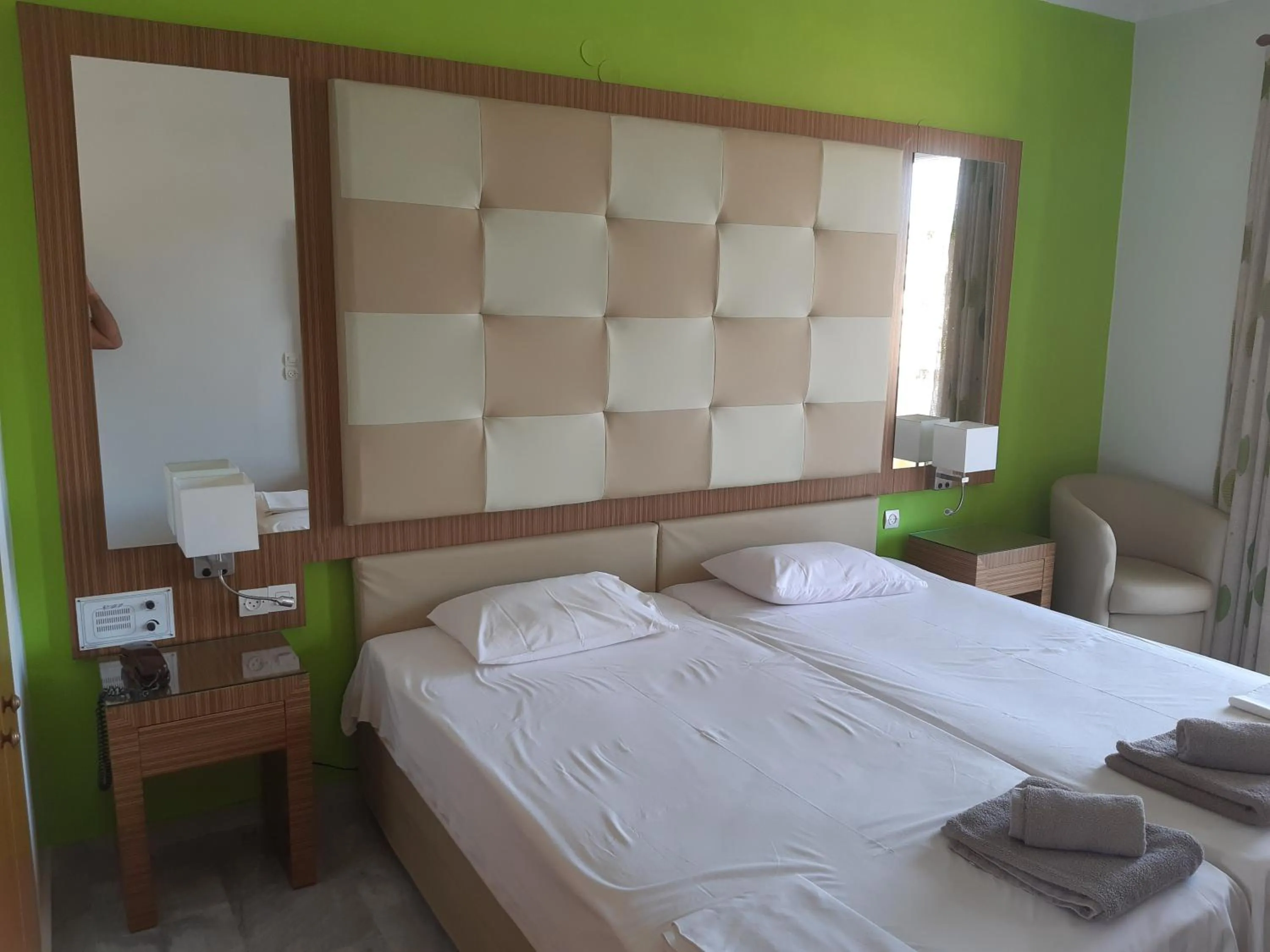 Bed in Kyriaki Hotel