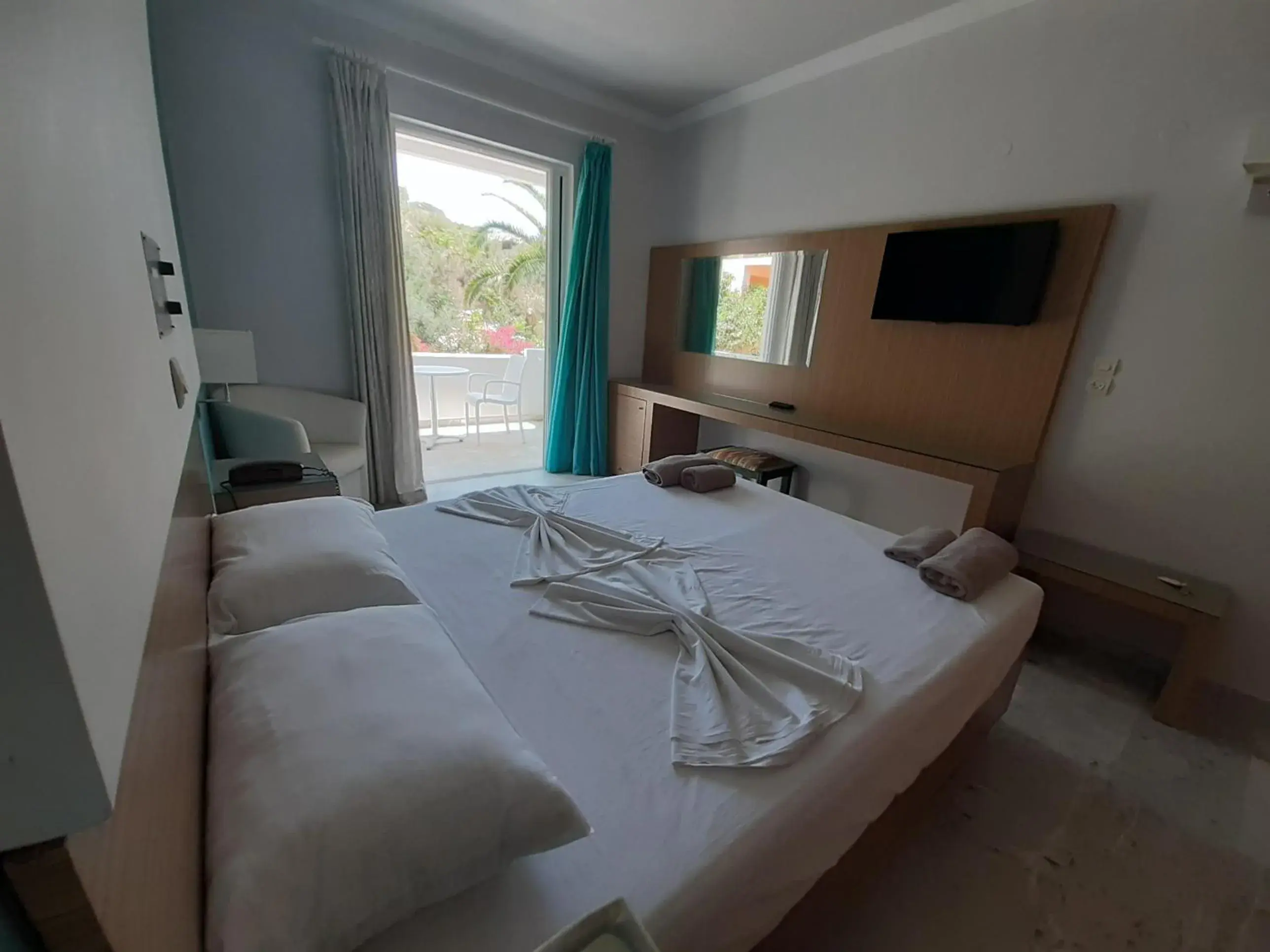 Bed in Kyriaki Hotel Bed in Kyriaki Hotel