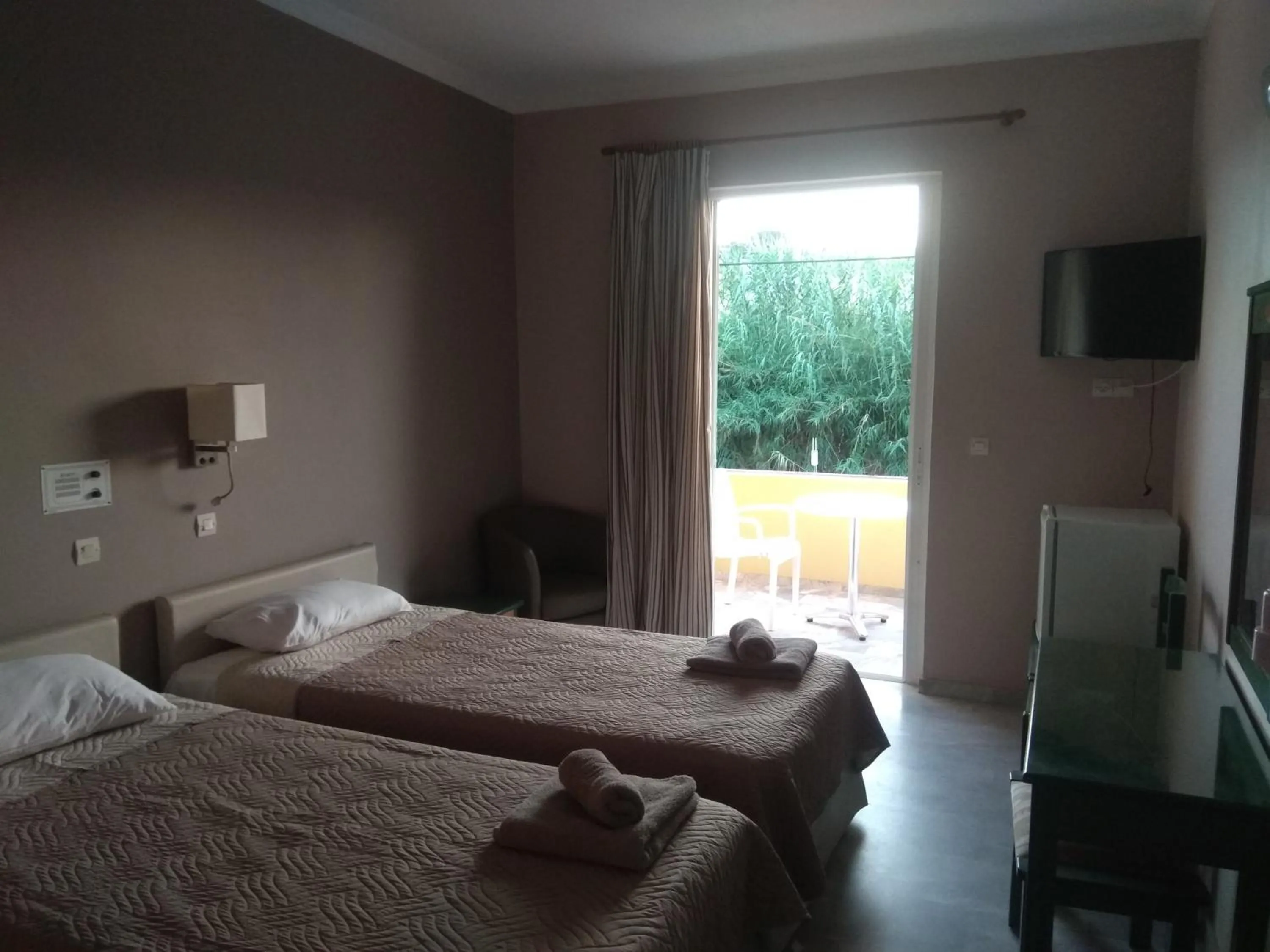 Bed in Kyriaki Hotel