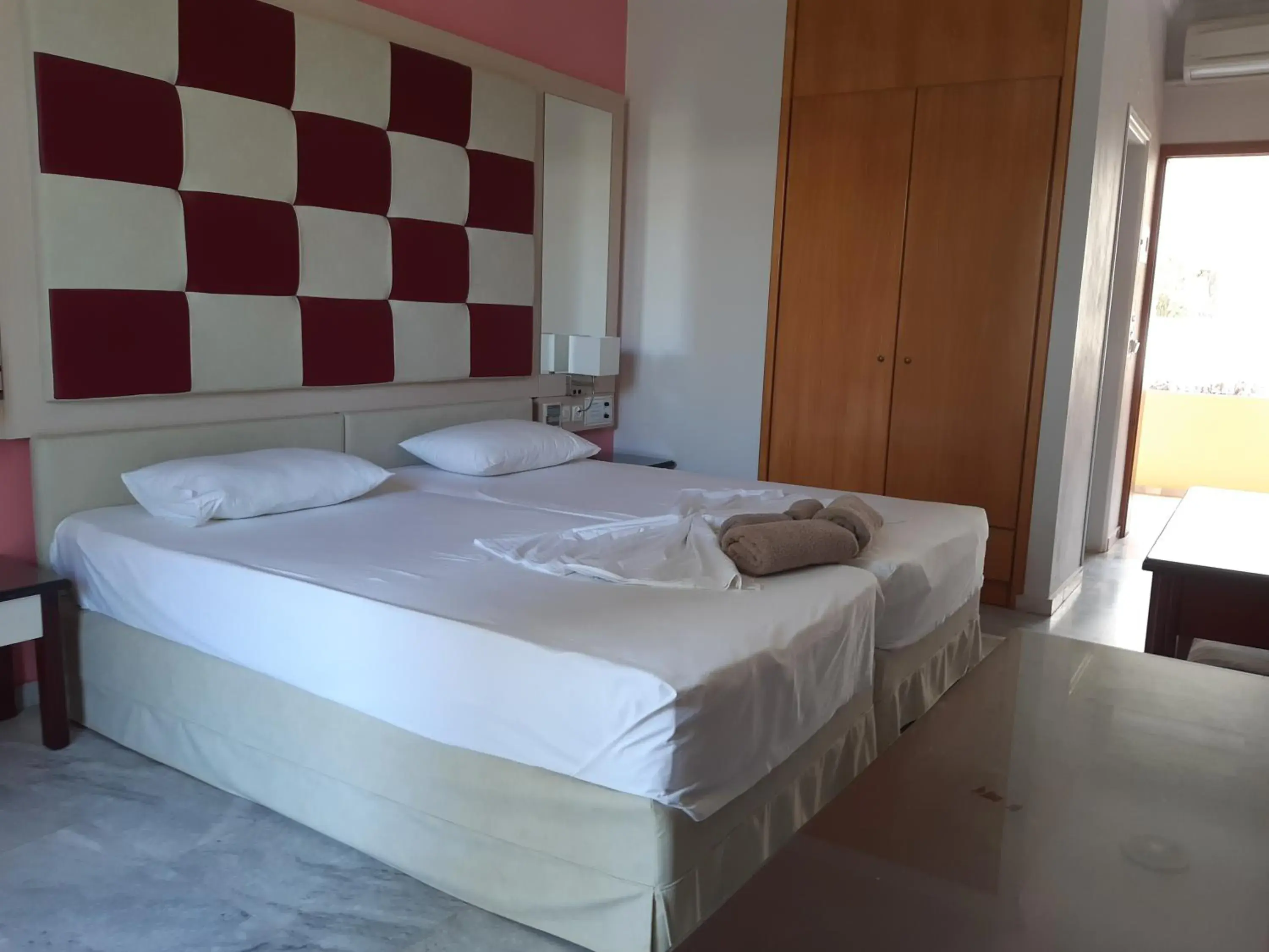 Bed in Kyriaki Hotel Bed in Kyriaki Hotel