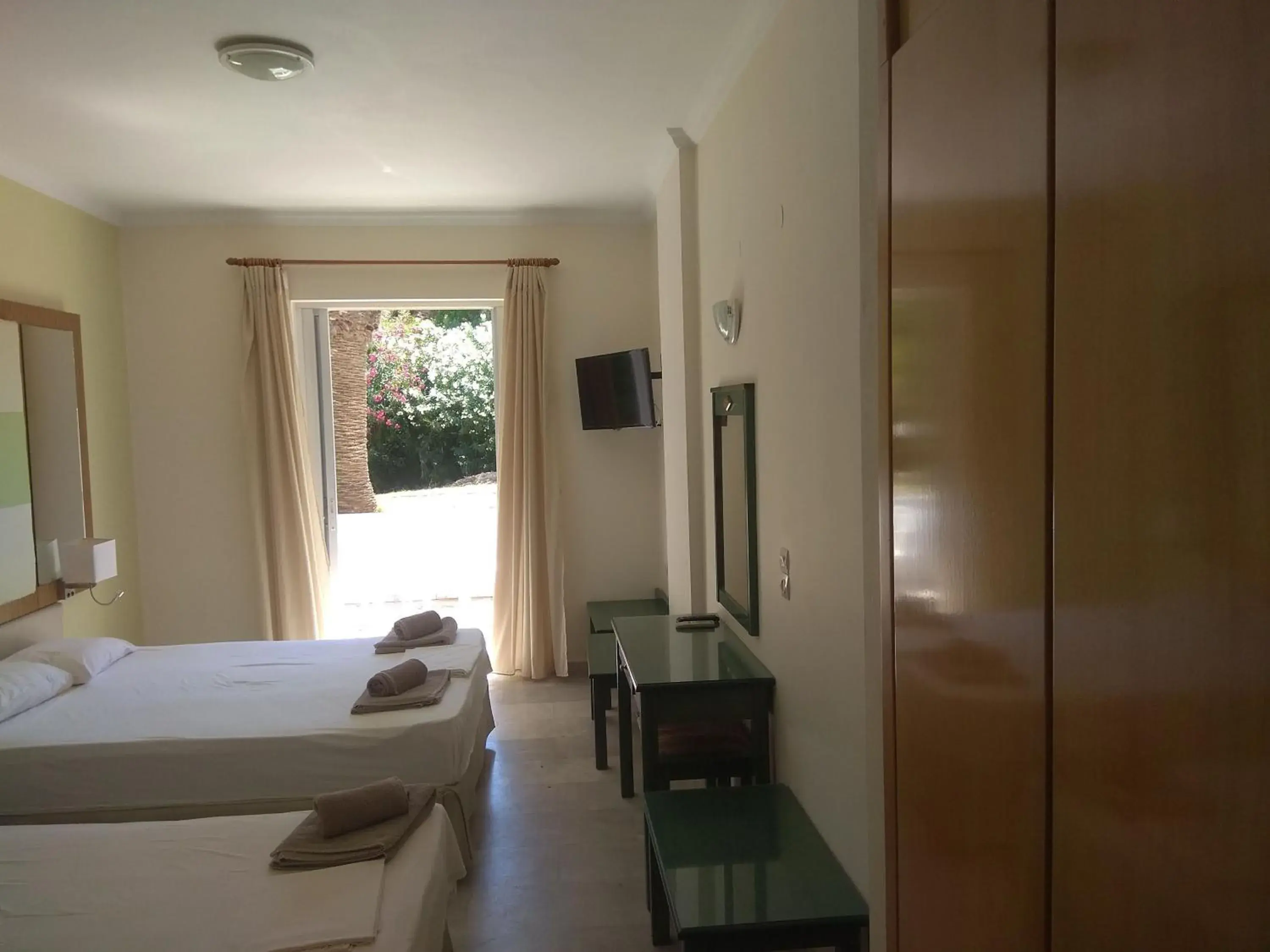 Bed in Kyriaki Hotel Bed in Kyriaki Hotel