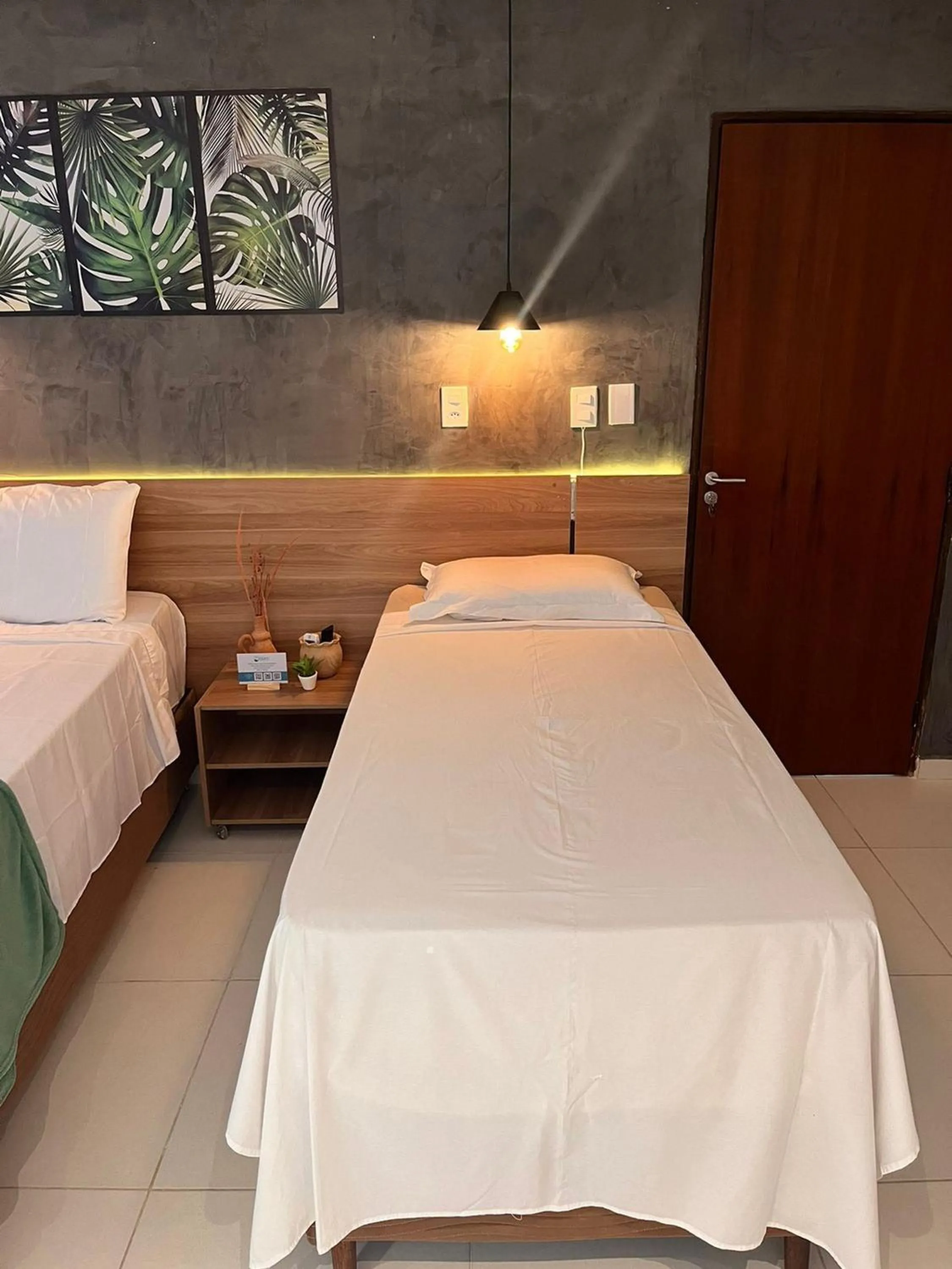 Bed in Pousada Maré do Francês