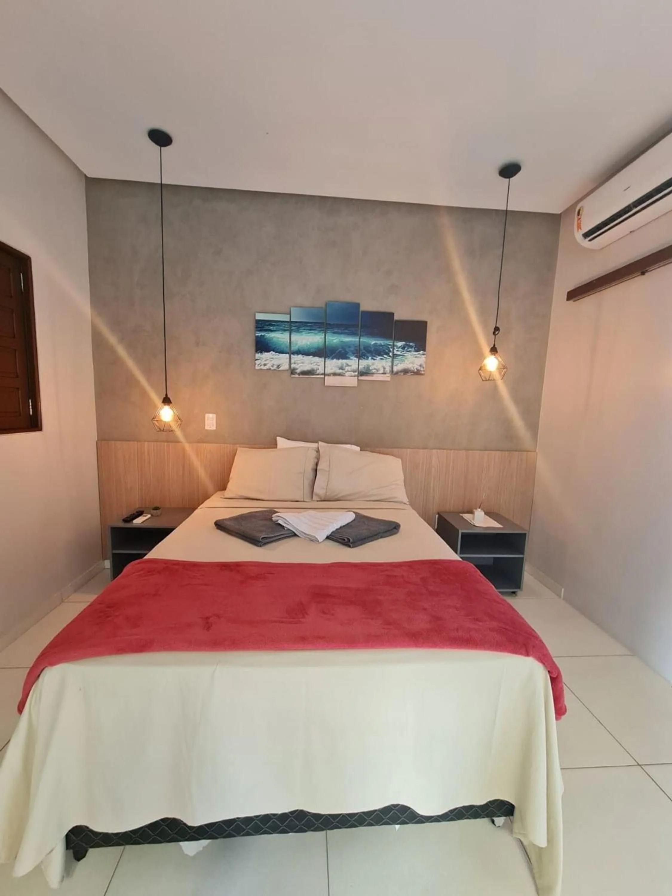 Bed in Pousada Maré do Francês