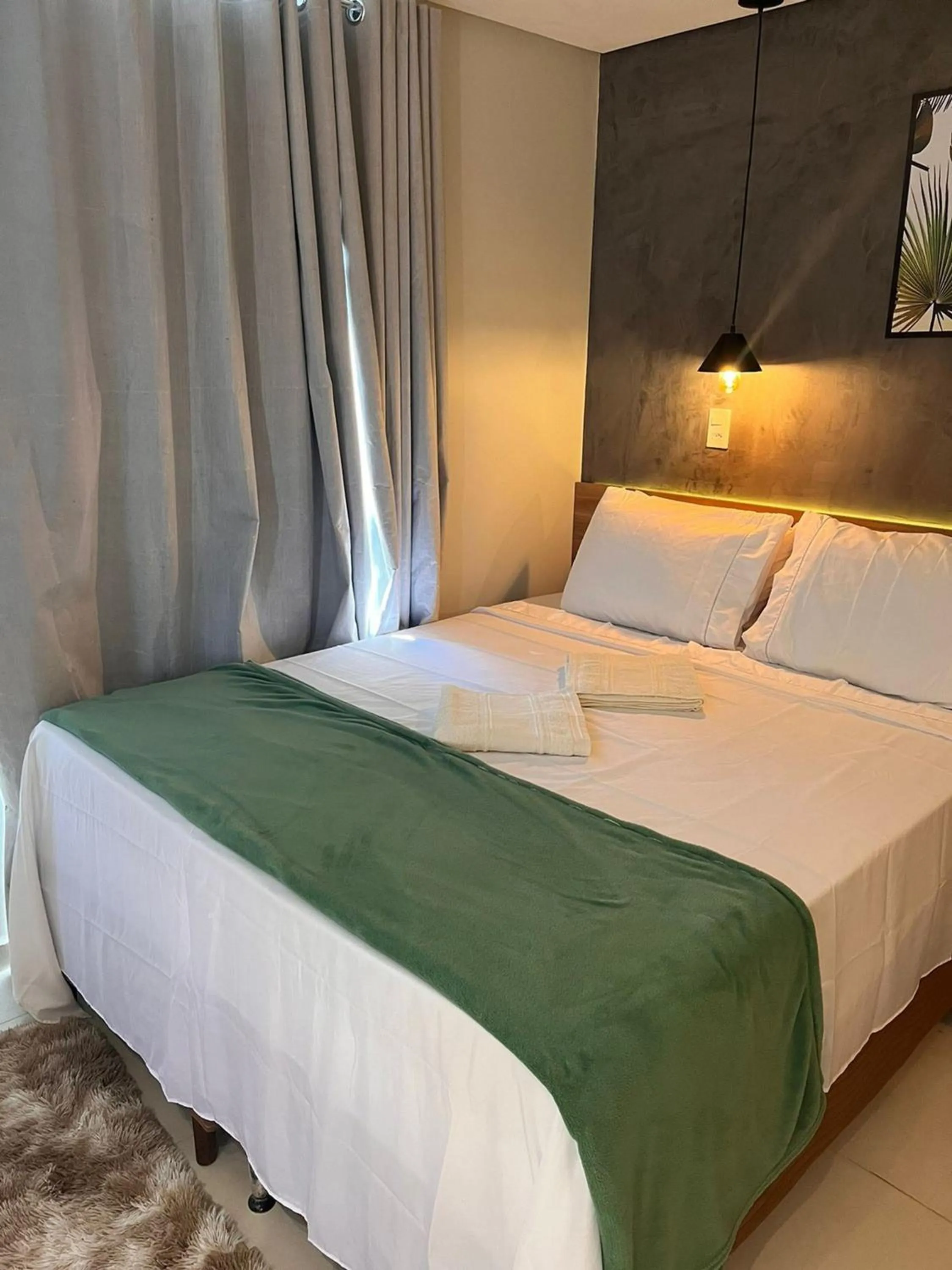 Bed in Pousada Maré do Francês