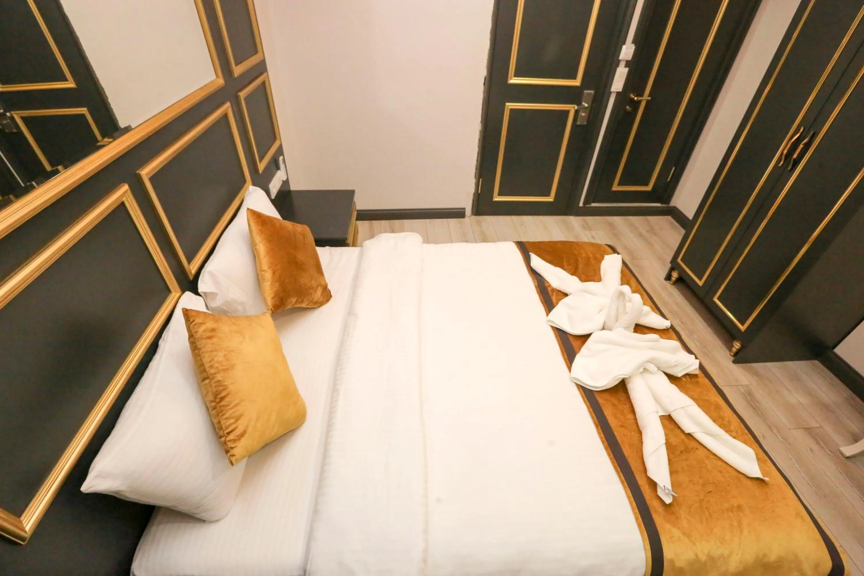 Bed in DNZ TAXIM FERİDİYE HoTEL