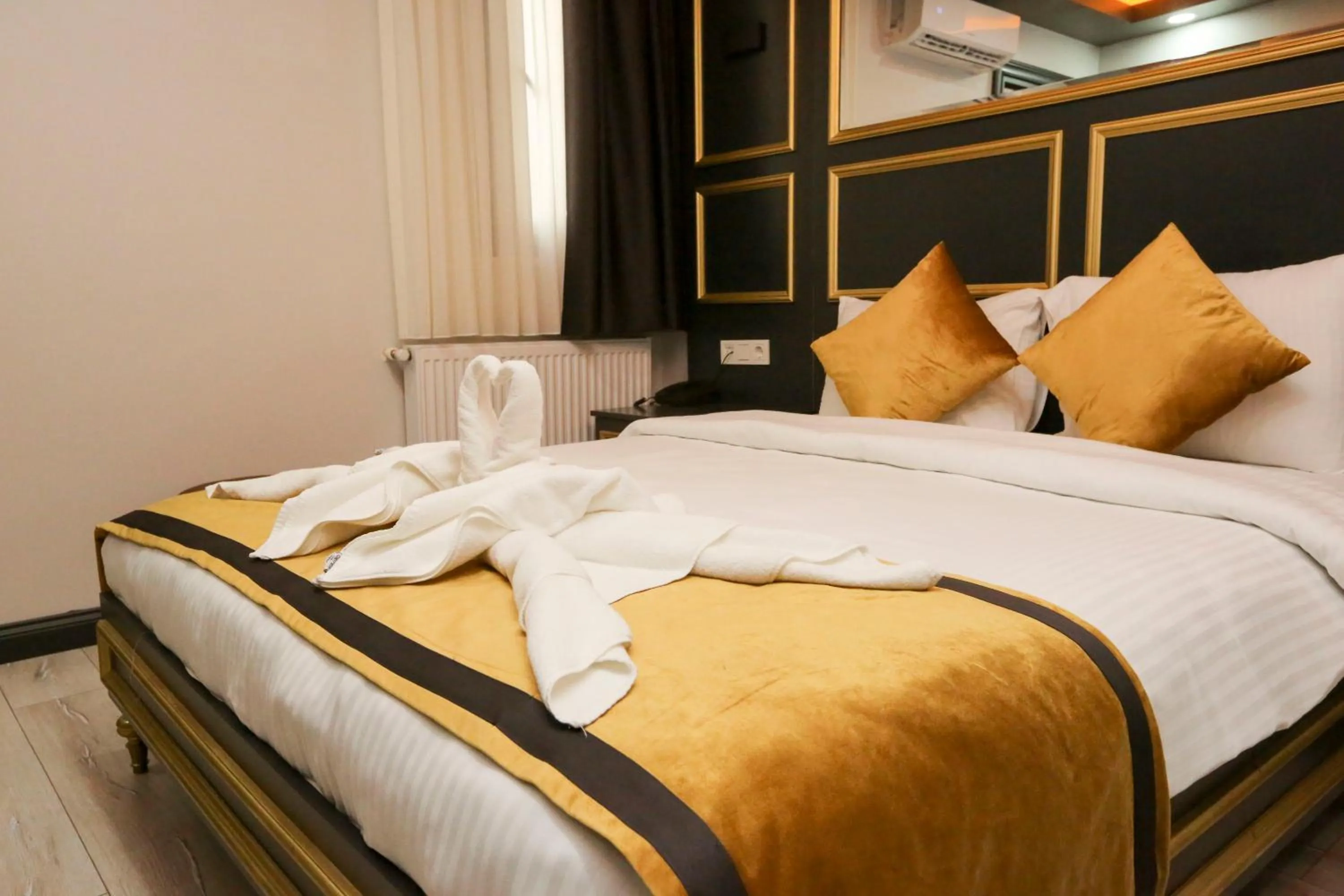 Bed in DNZ TAXIM FERİDİYE HoTEL