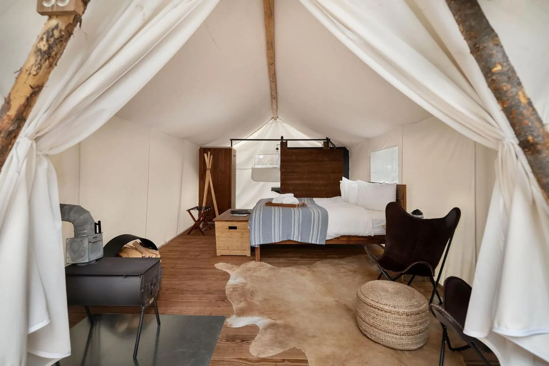 Photo of the whole room, Bed in Under Canvas Acadia