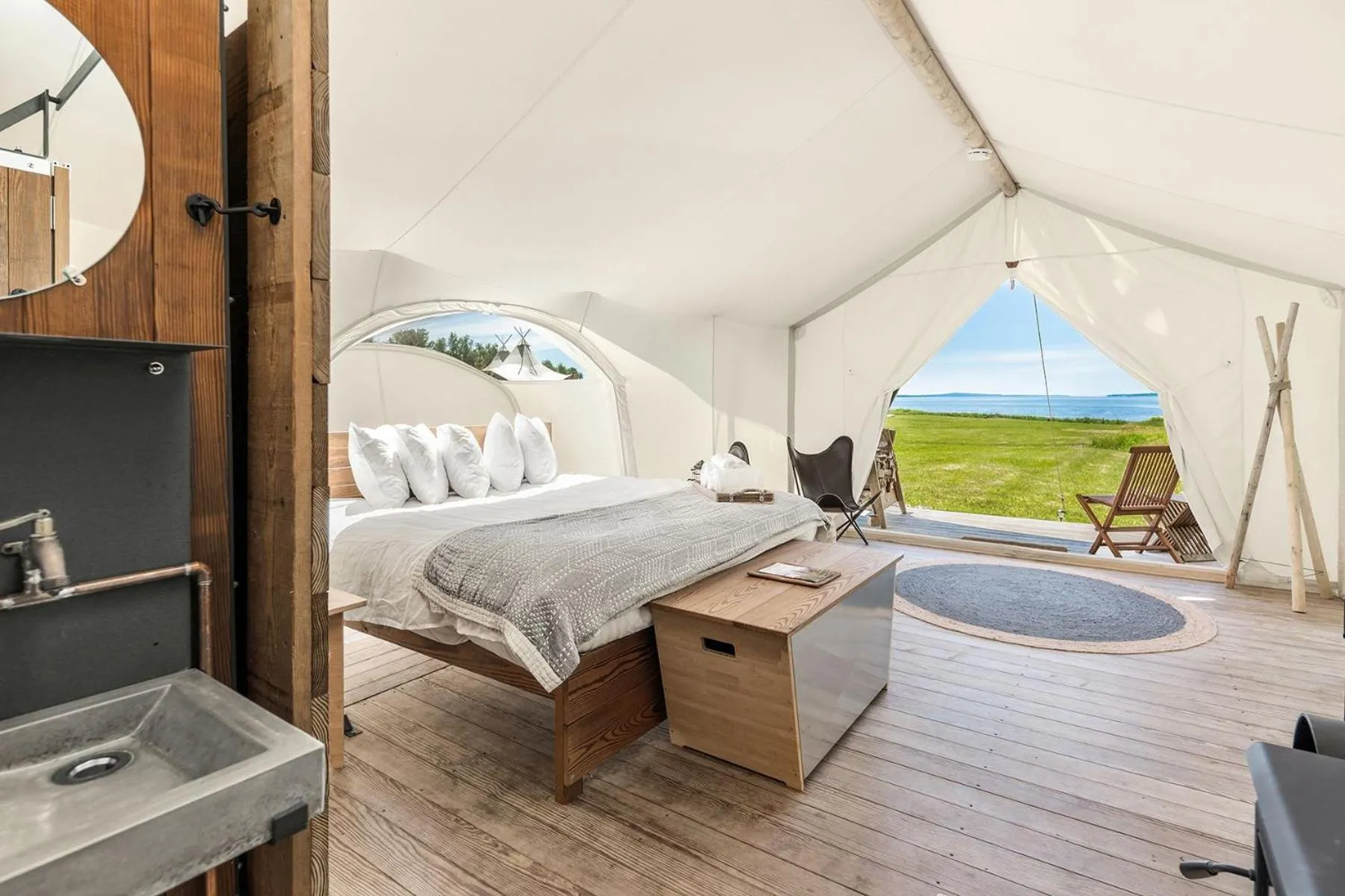 Photo of the whole room, Bed in Under Canvas Acadia