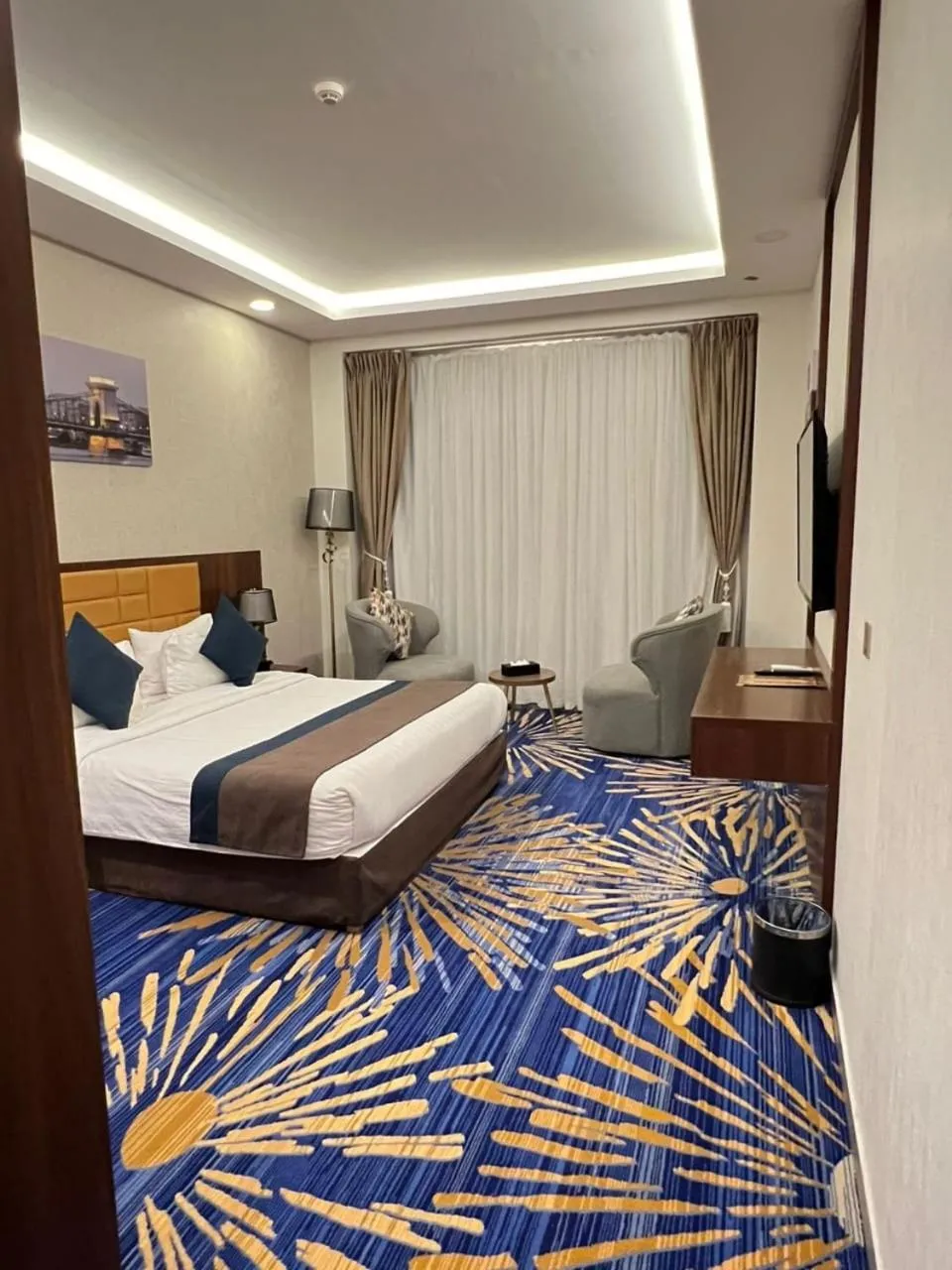 Seating area, Bed in Holiday Al Khaleej Hotel