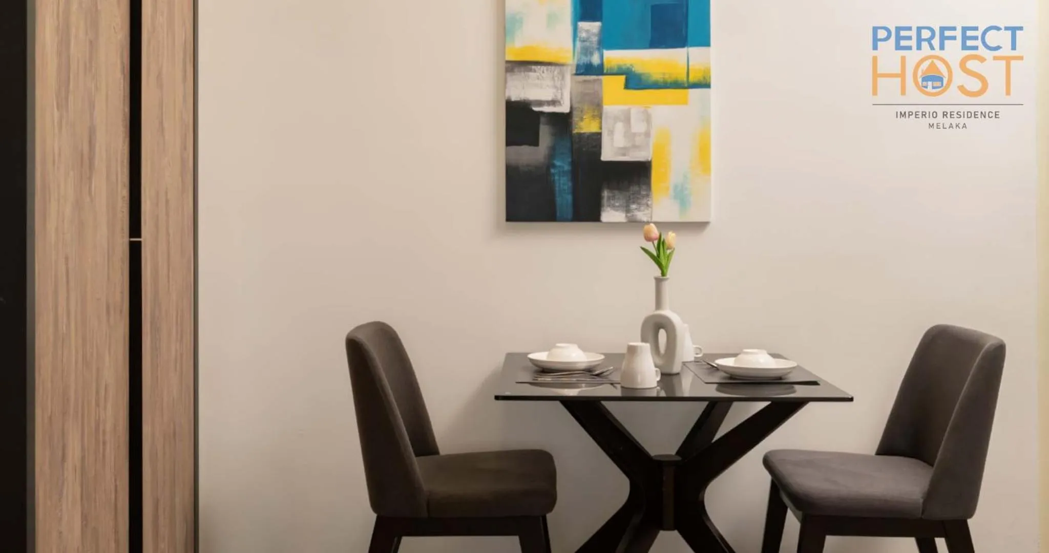 Living room in Imperio Residence Seafront by Perfect Host