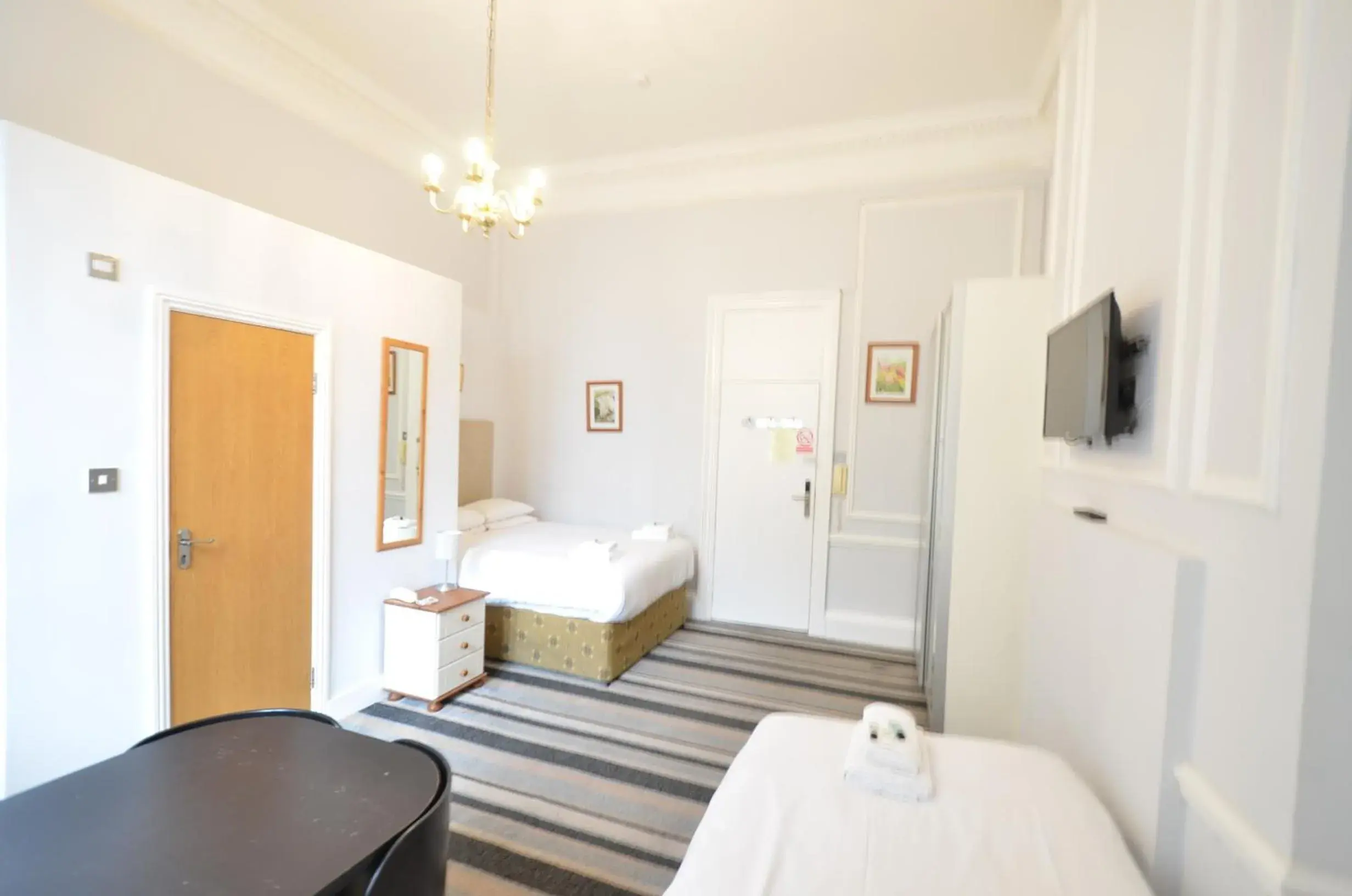 Bedroom in Amber Residence Hotel-Suites Bedroom in Amber Residence Hotel-Suites