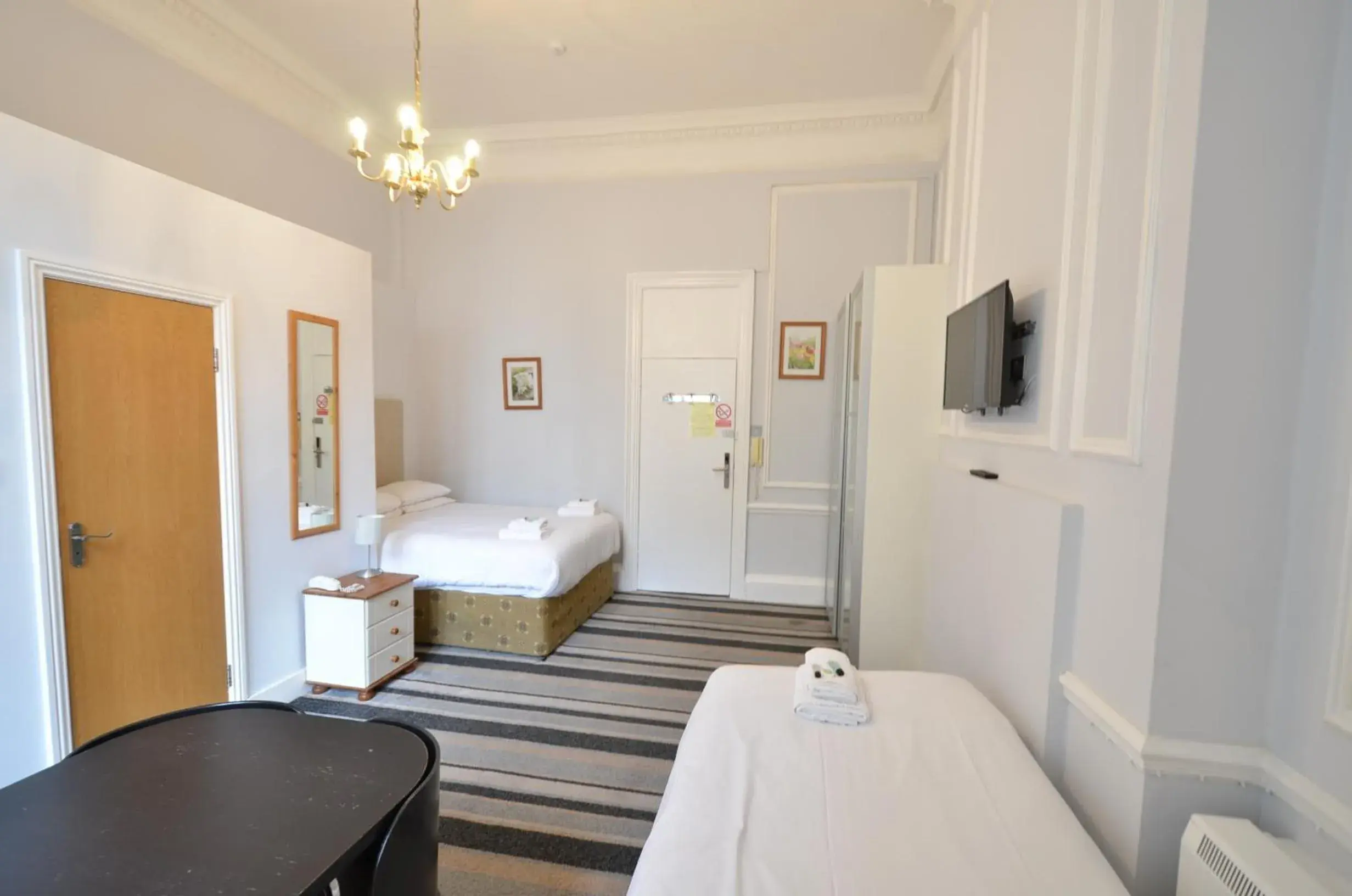 Bedroom in Amber Residence Hotel-Suites Bedroom in Amber Residence Hotel-Suites