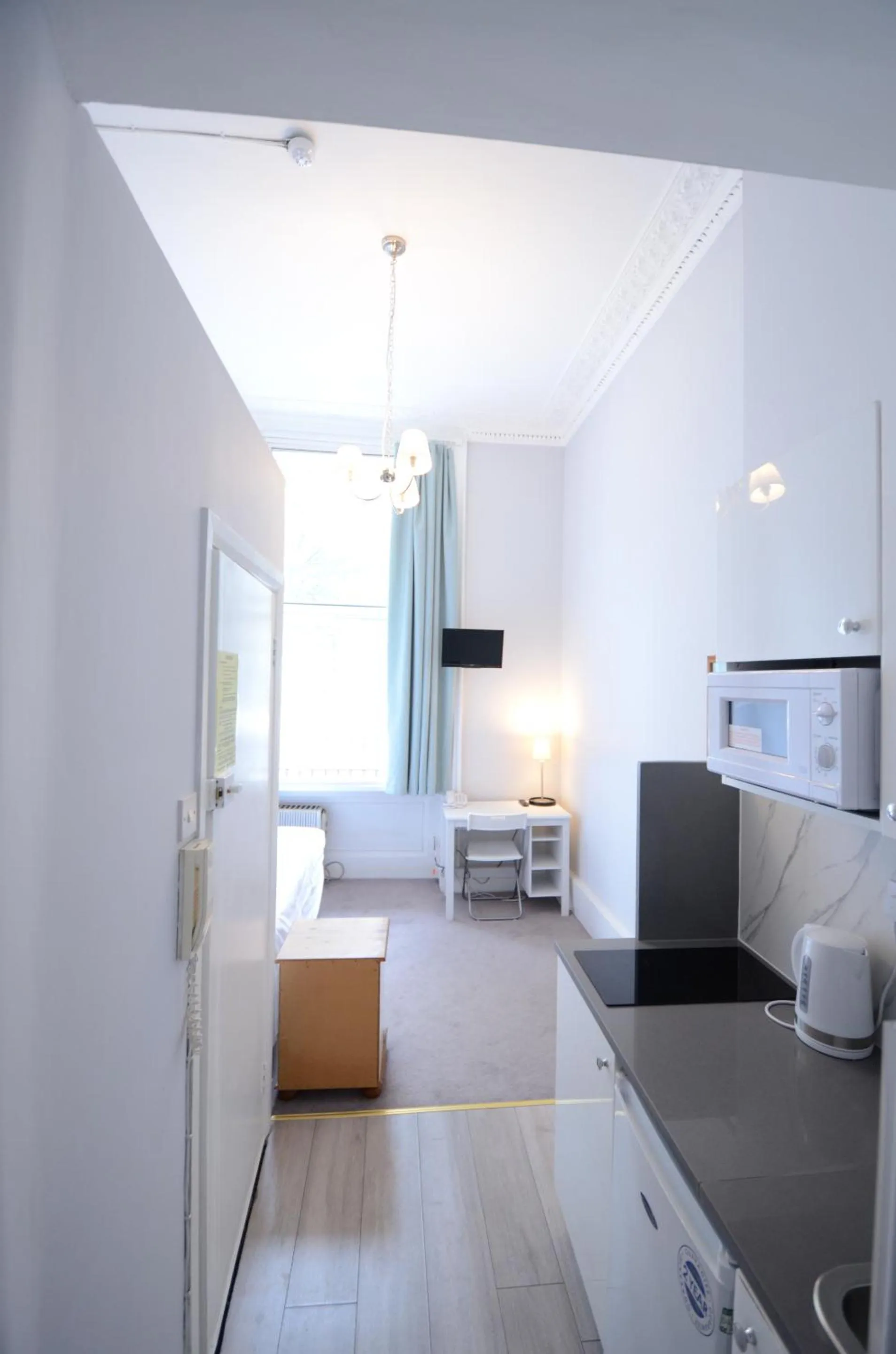 Kitchen or kitchenette, Bed in Amber Residence Hotel-Suites