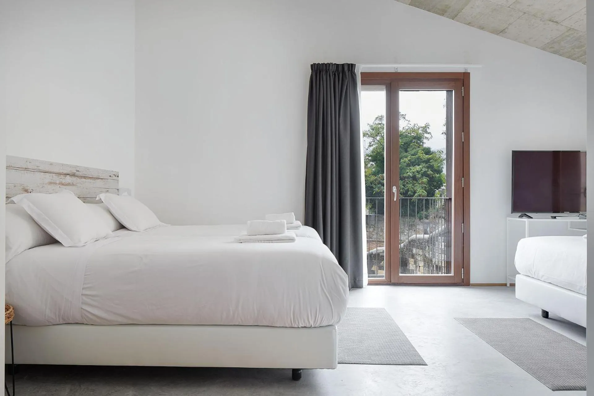 Bed in IRAIPE Estella Rooms Auto Check-in