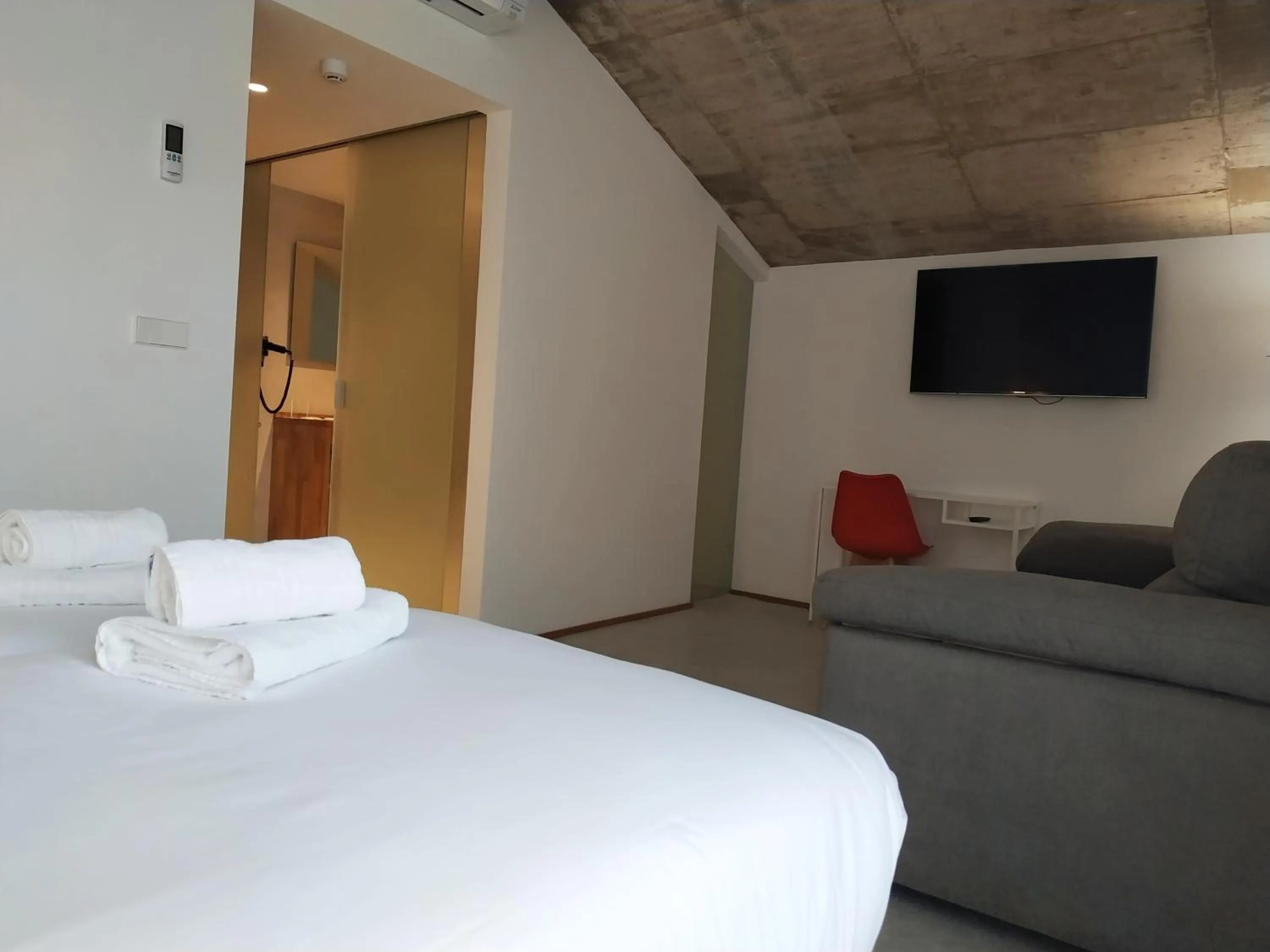Bed in IRAIPE Estella Rooms Auto Check-in