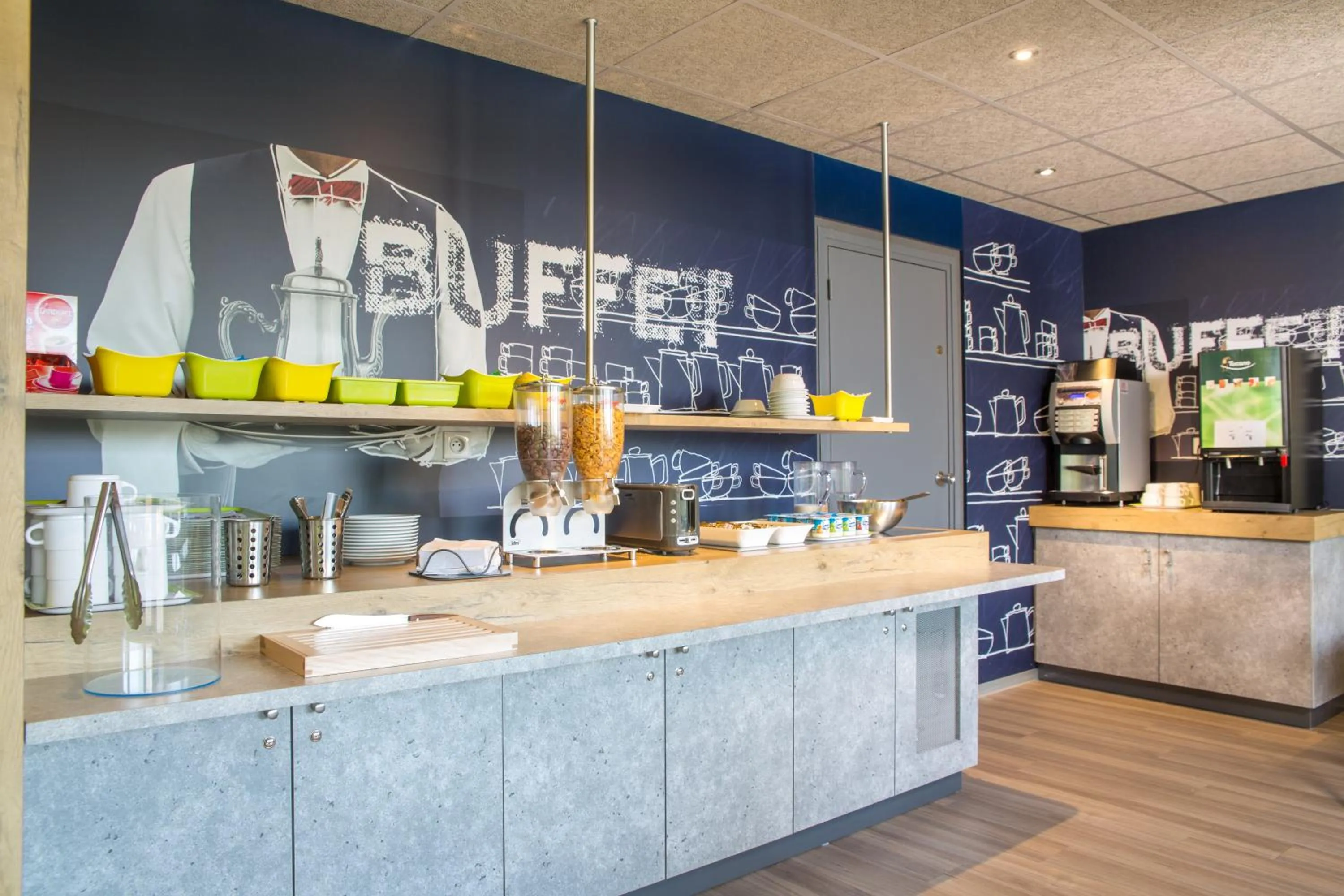 Lounge or bar in ibis budget Caen Mondeville