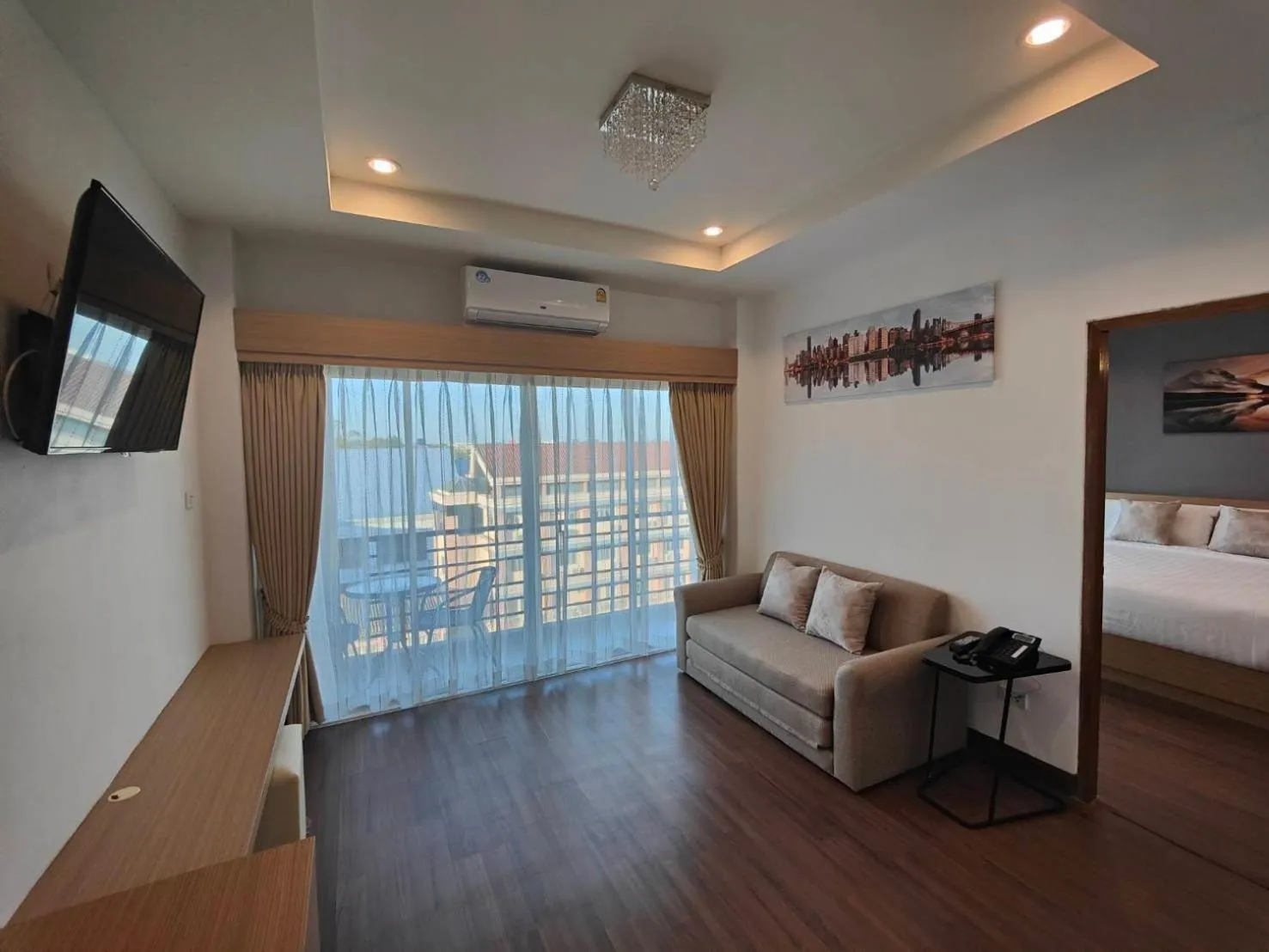 Bed in The Cottage Hotel Udon Thani