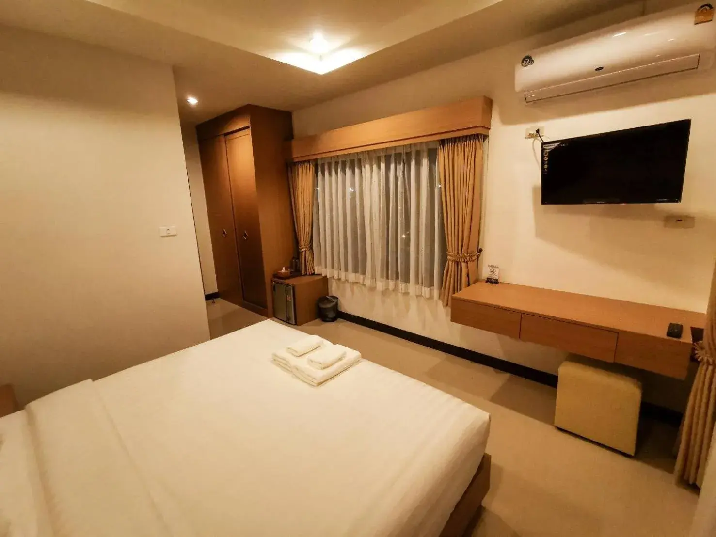 Bed in The Cottage Hotel Udon Thani Bed in The Cottage Hotel Udon Thani