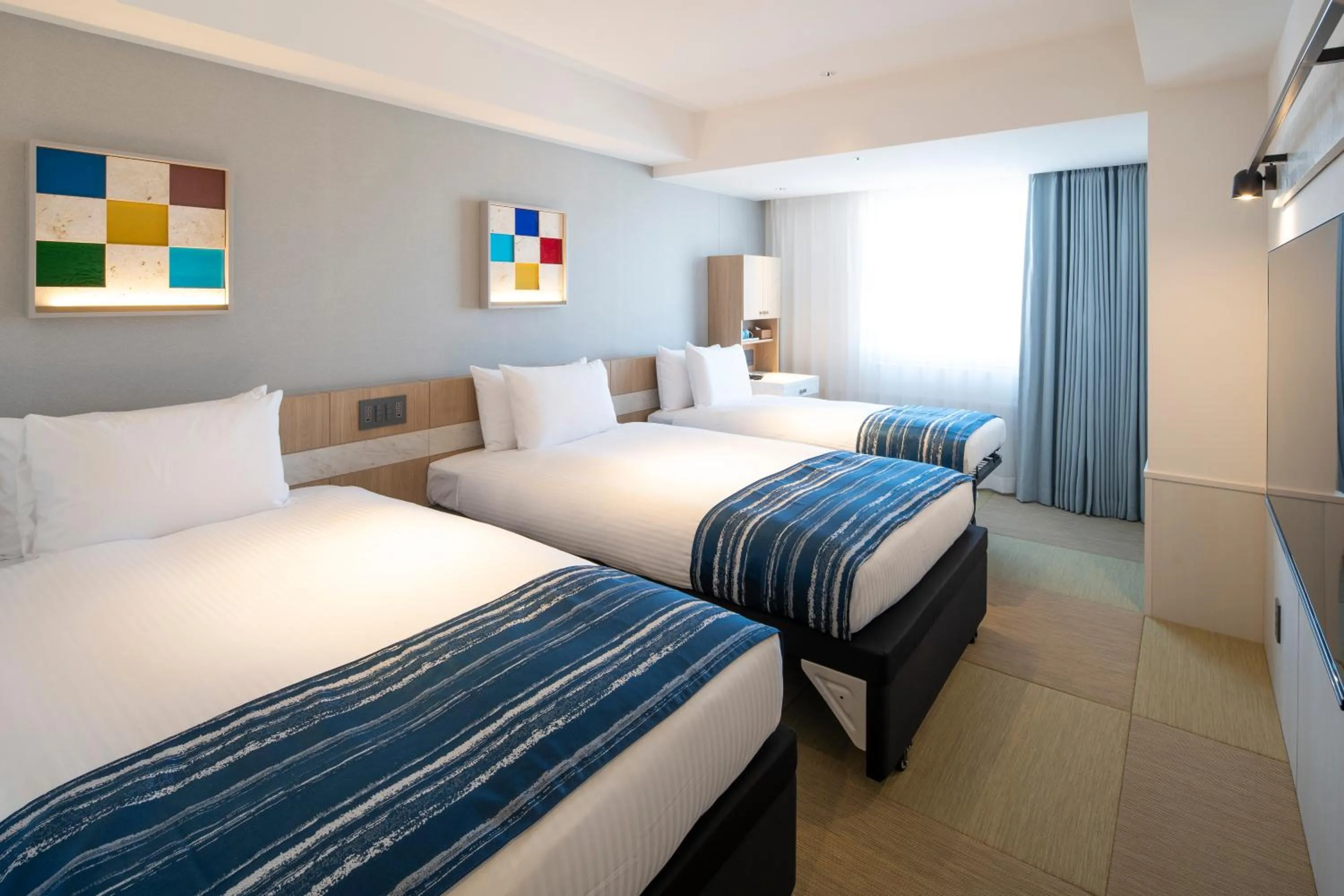 Bedroom, Bed in Okinawa Hinode Resort and Hot Spring Hotel