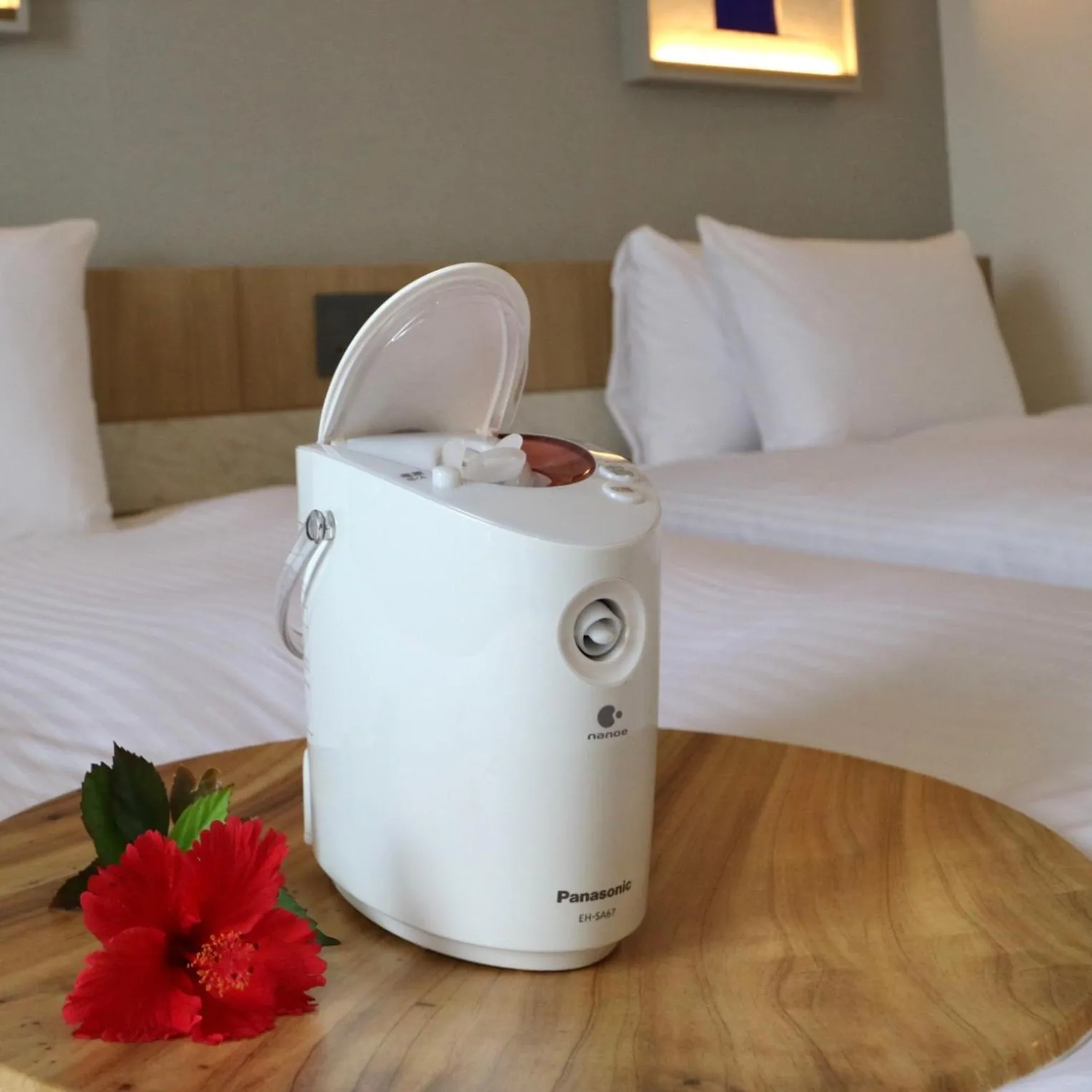 room service, Bed in Okinawa Hinode Resort and Hot Spring Hotel