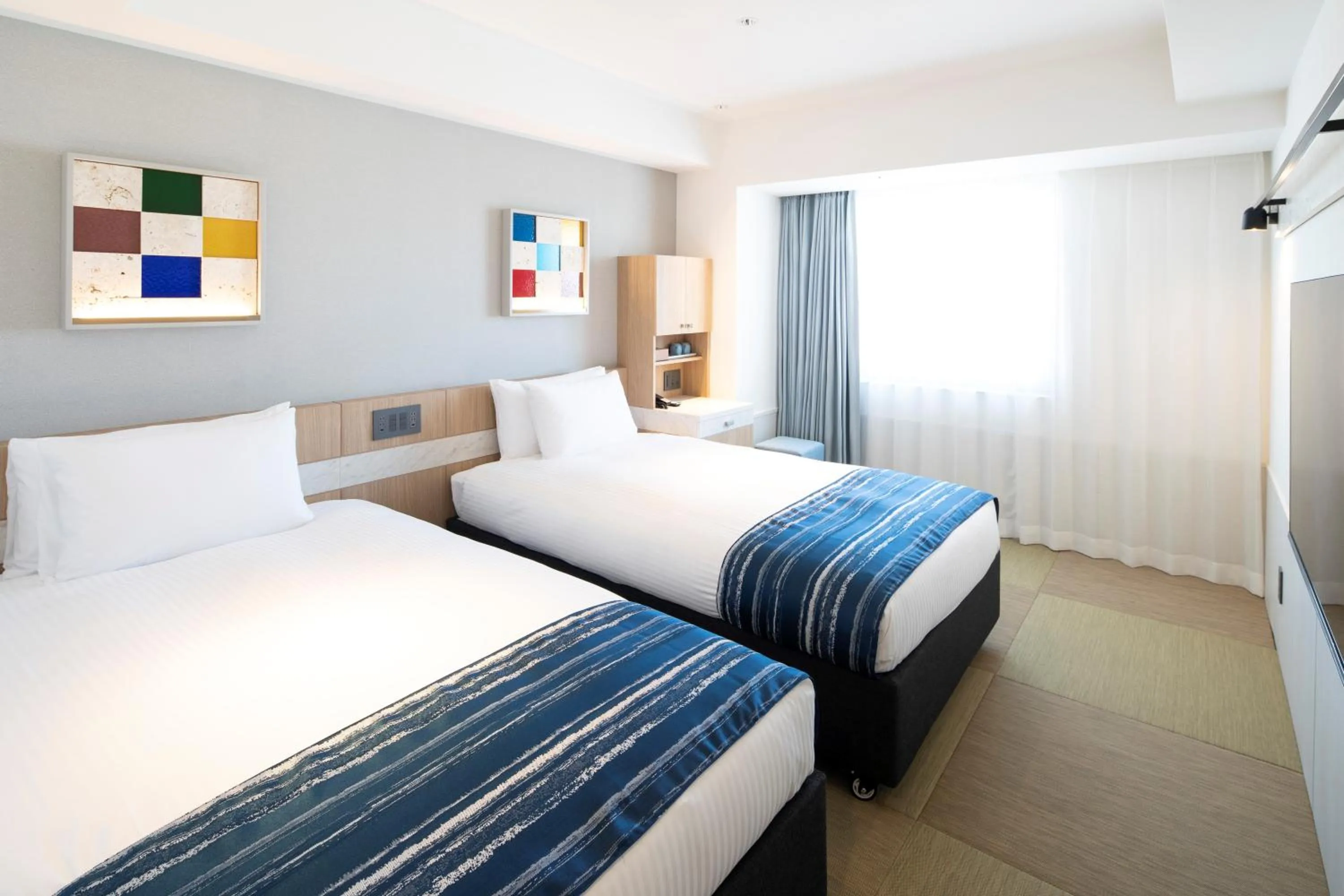 Bedroom, Bed in Okinawa Hinode Resort and Hot Spring Hotel