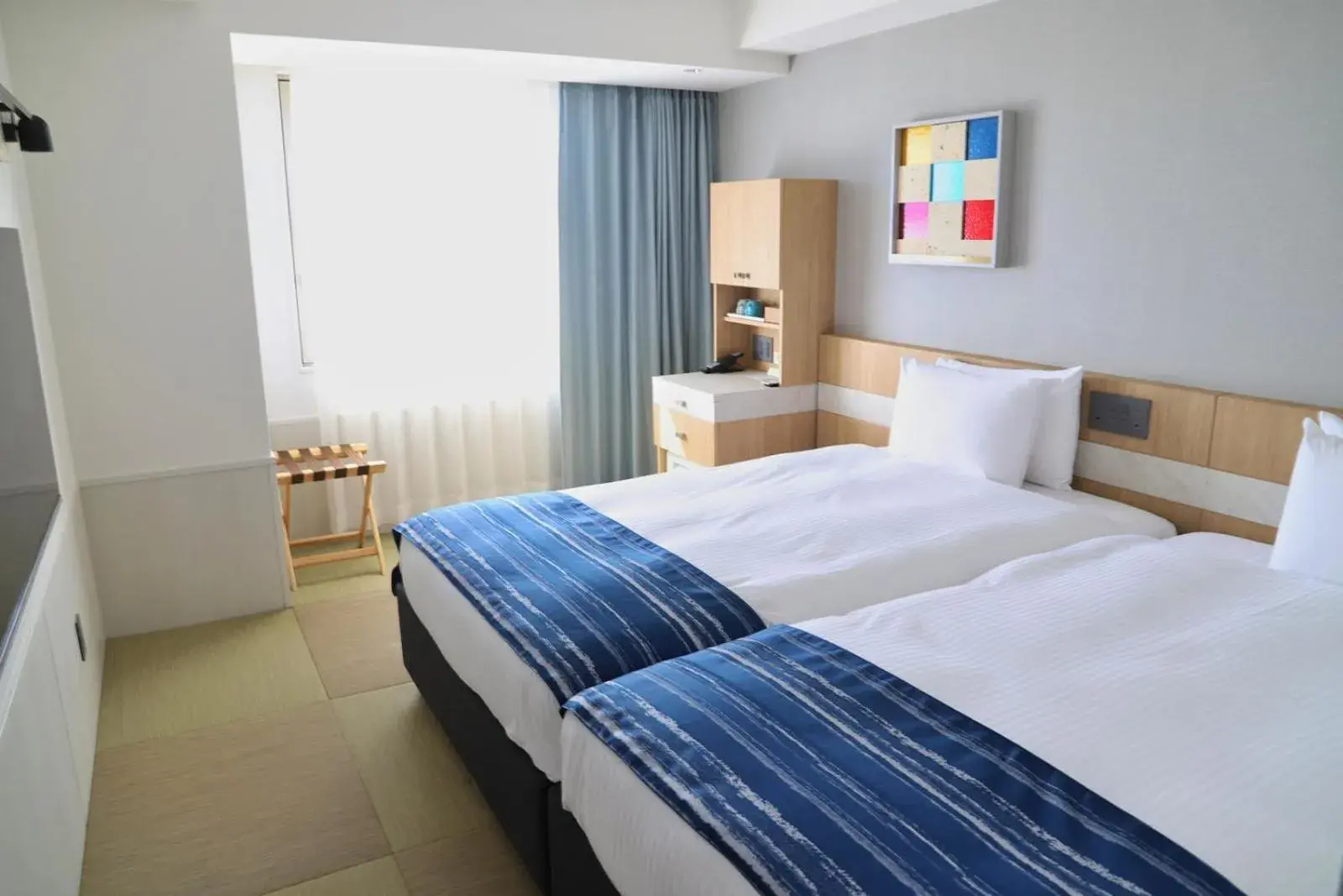 Bed in Okinawa Hinode Resort and Hot Spring Hotel Bed in Okinawa Hinode Resort and Hot Spring Hotel
