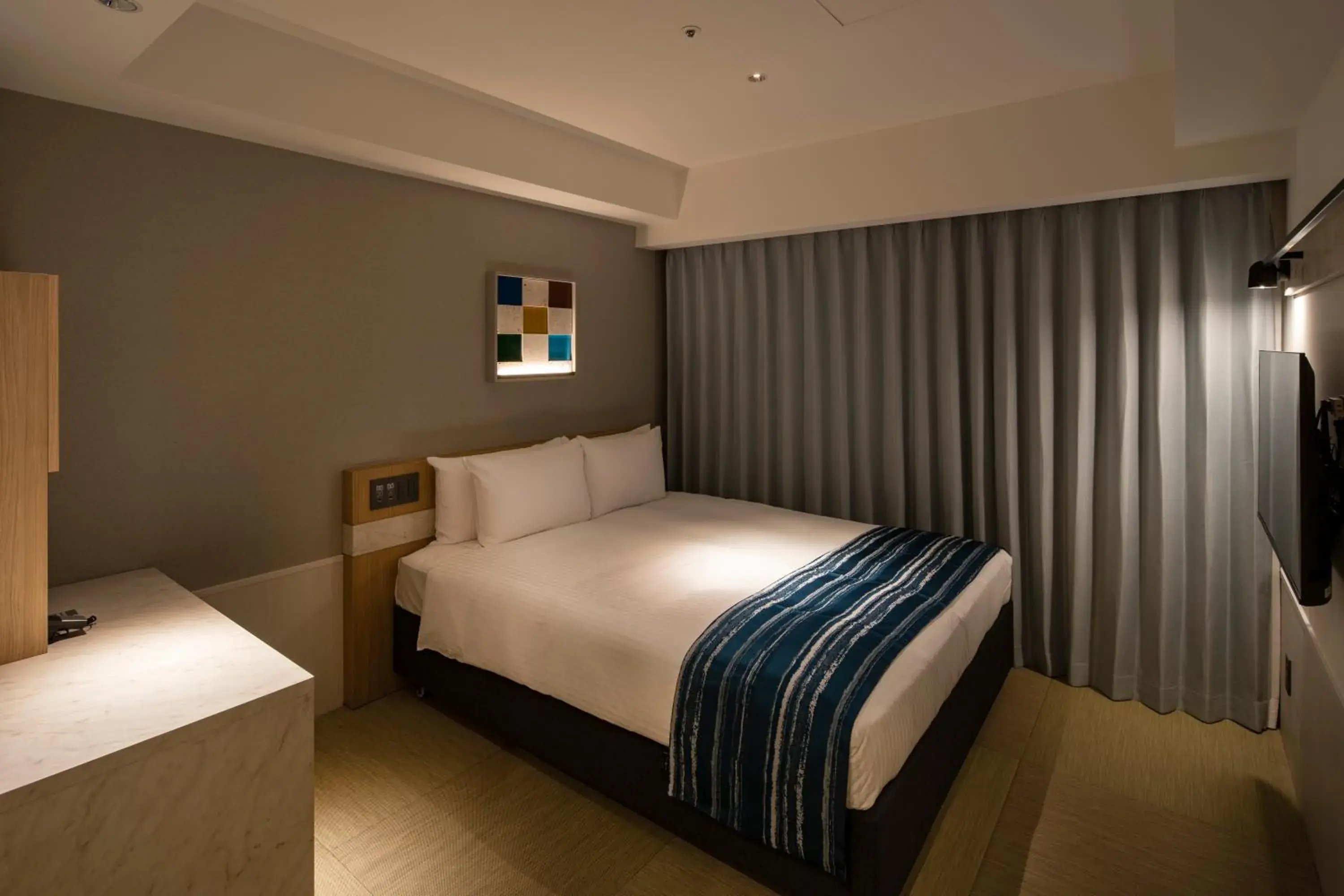 Bed in Okinawa Hinode Resort and Hot Spring Hotel Bed in Okinawa Hinode Resort and Hot Spring Hotel