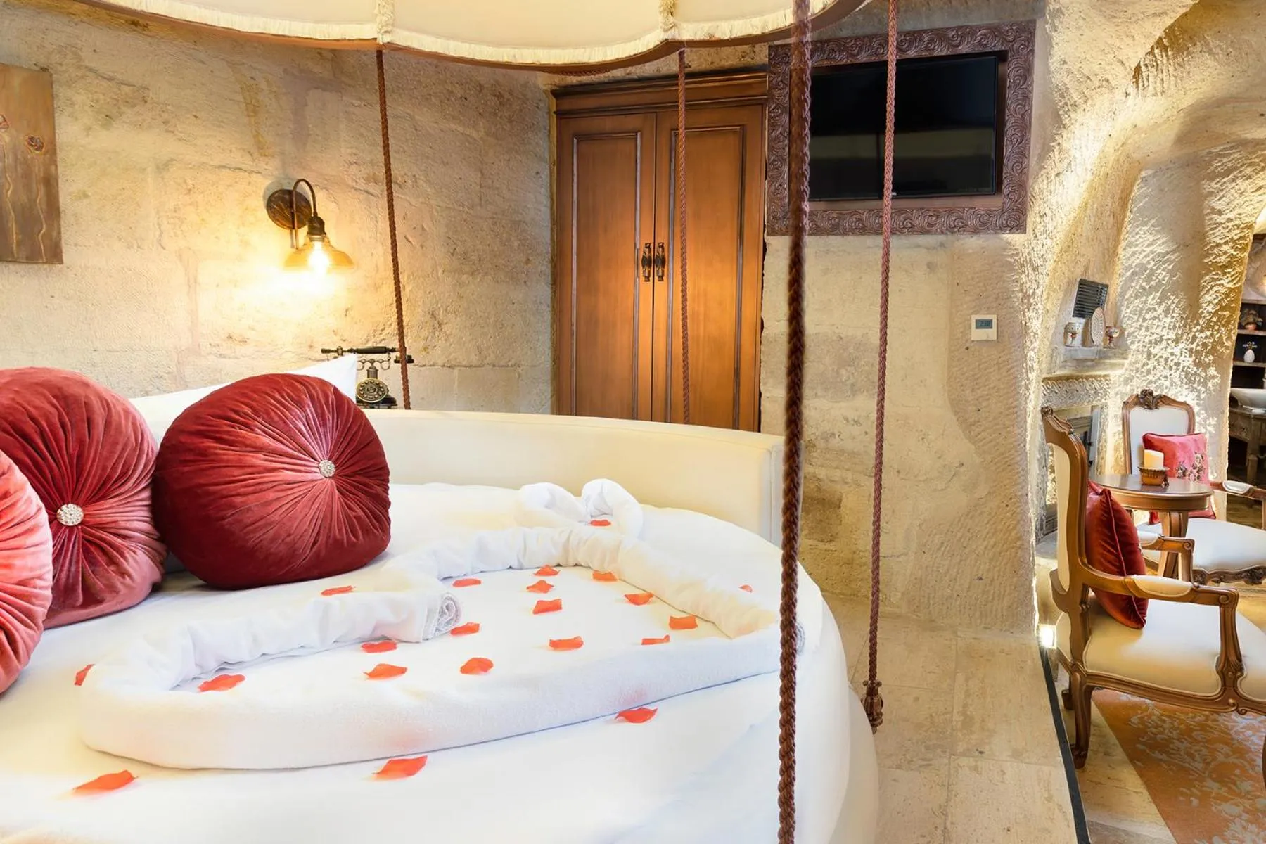 Bed in Elysion Cave Suites