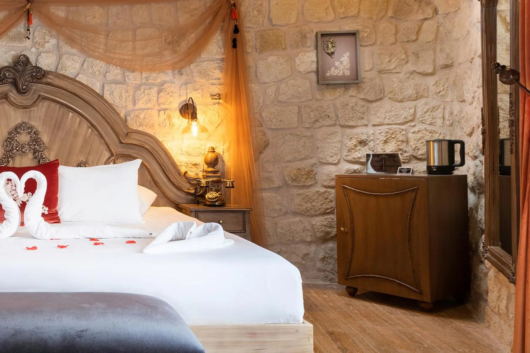 Bed in Elysion Cave Suites