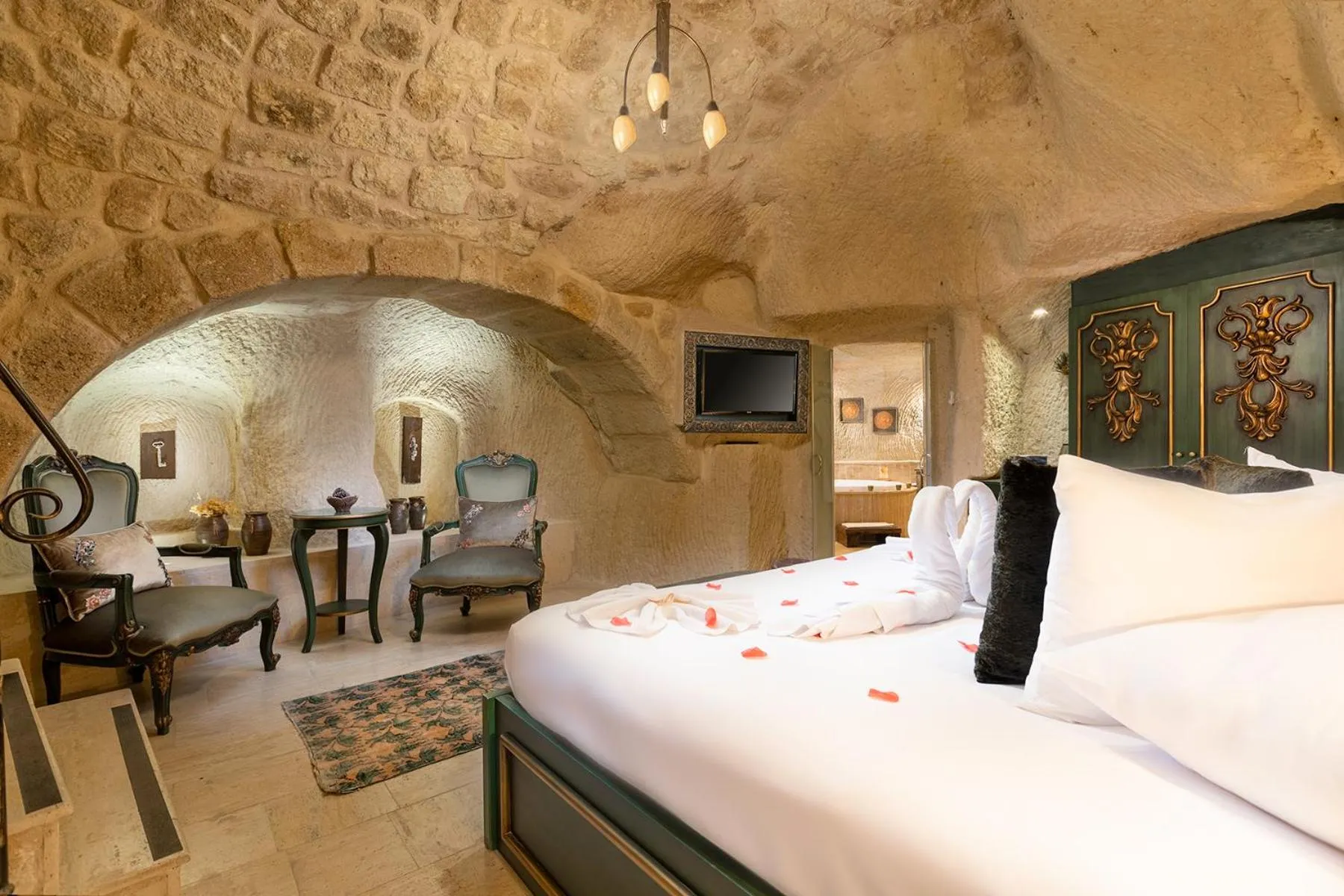 Bed in Elysion Cave Suites