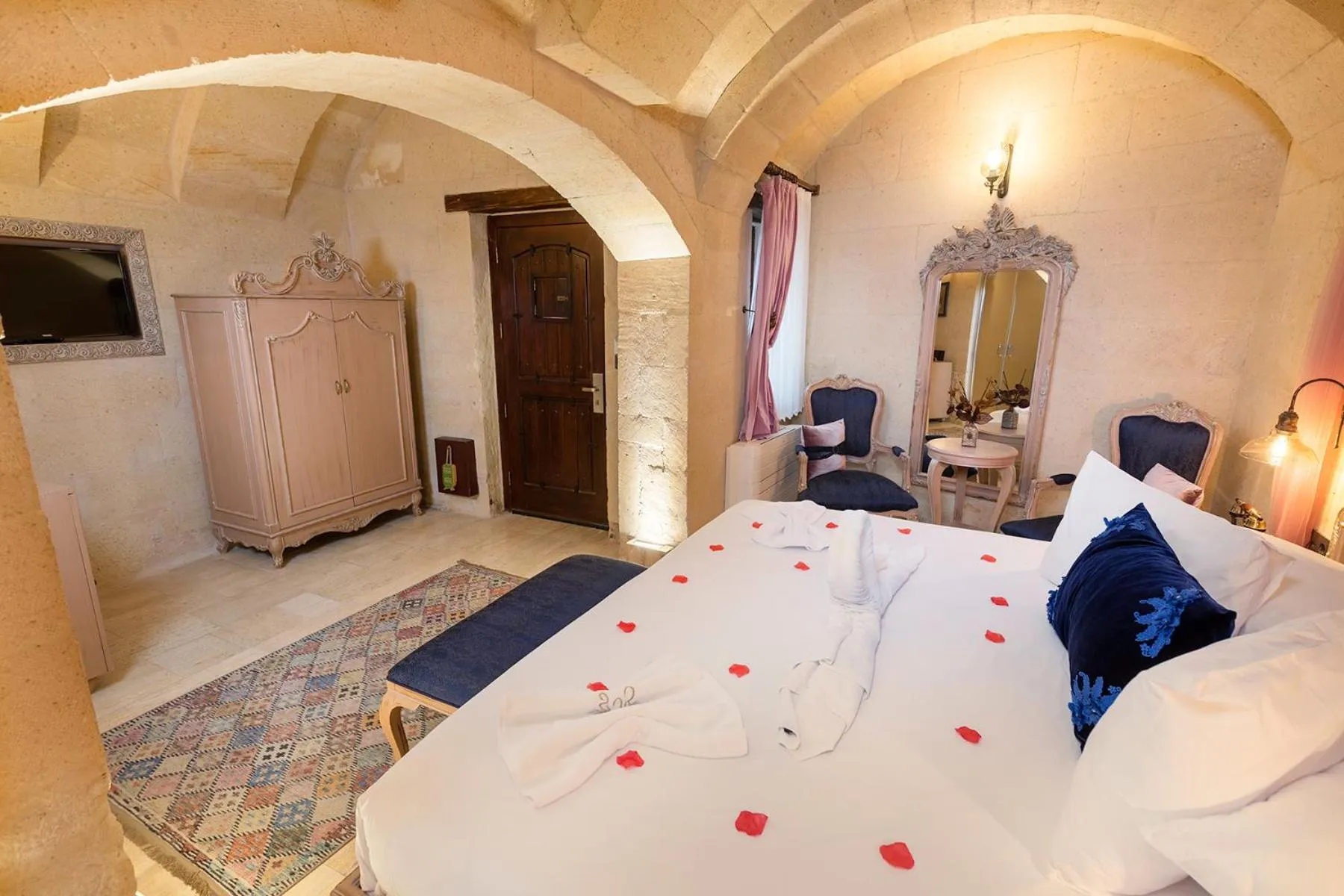 Bed in Elysion Cave Suites