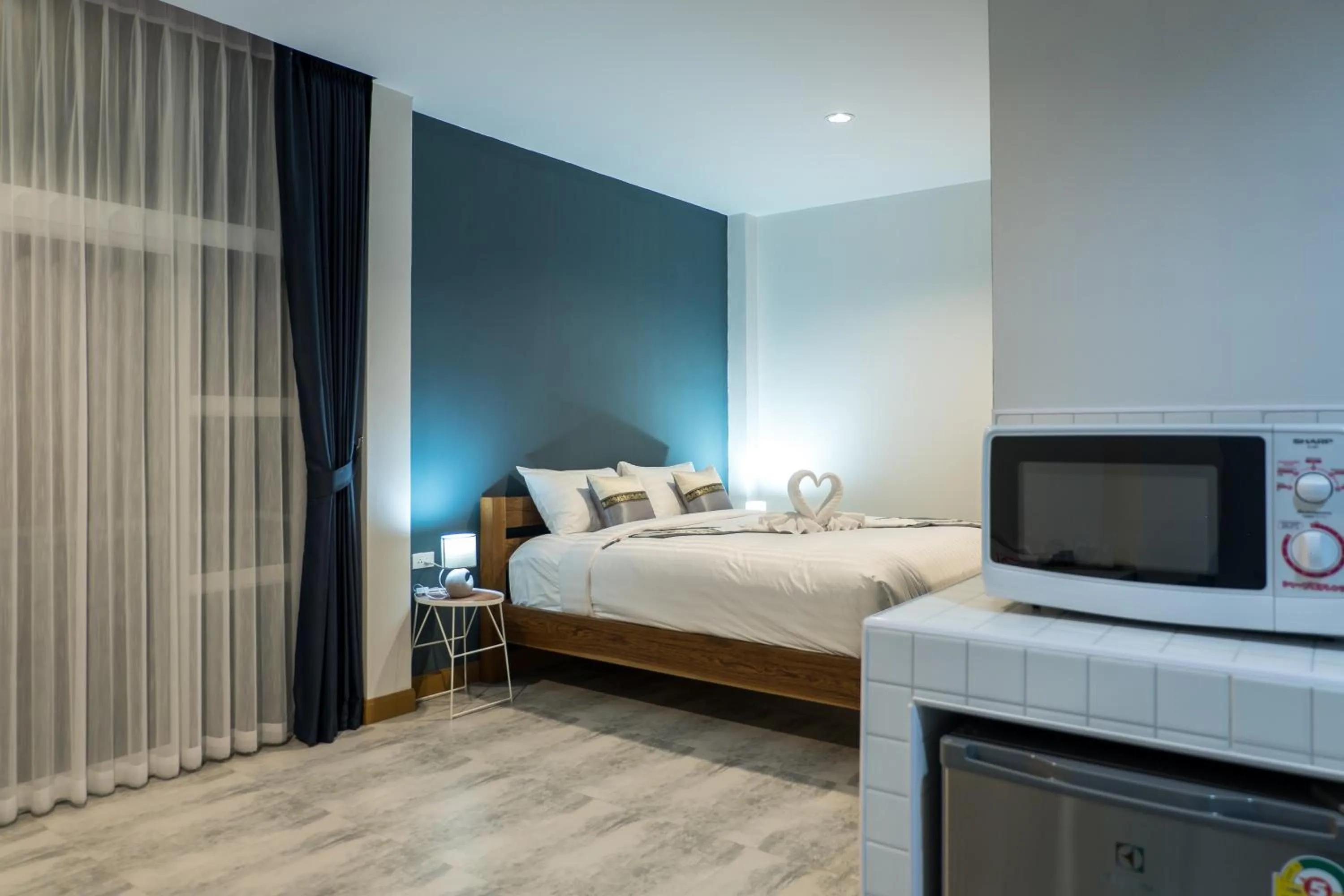 Kitchen or kitchenette, Bed in PaiApartHotel