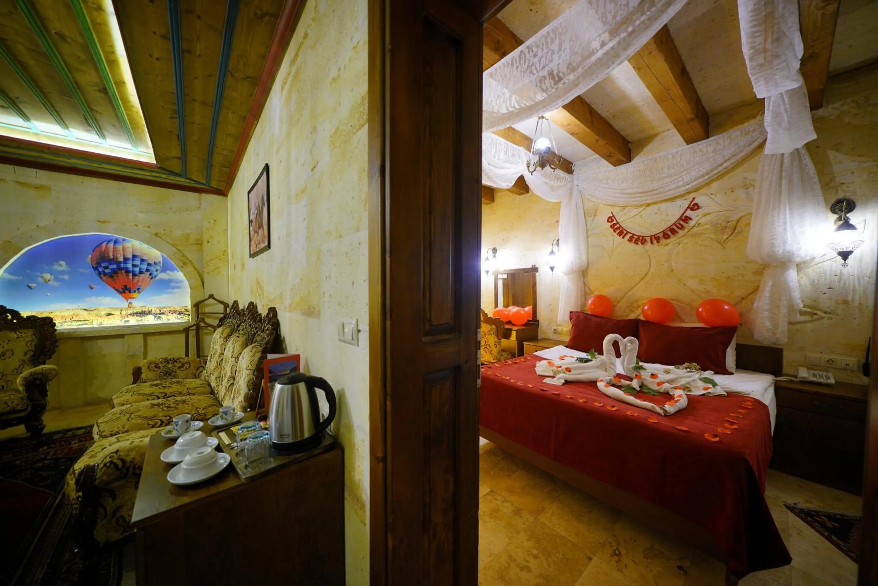 Living room, Bed in Balloon Cave Hotel