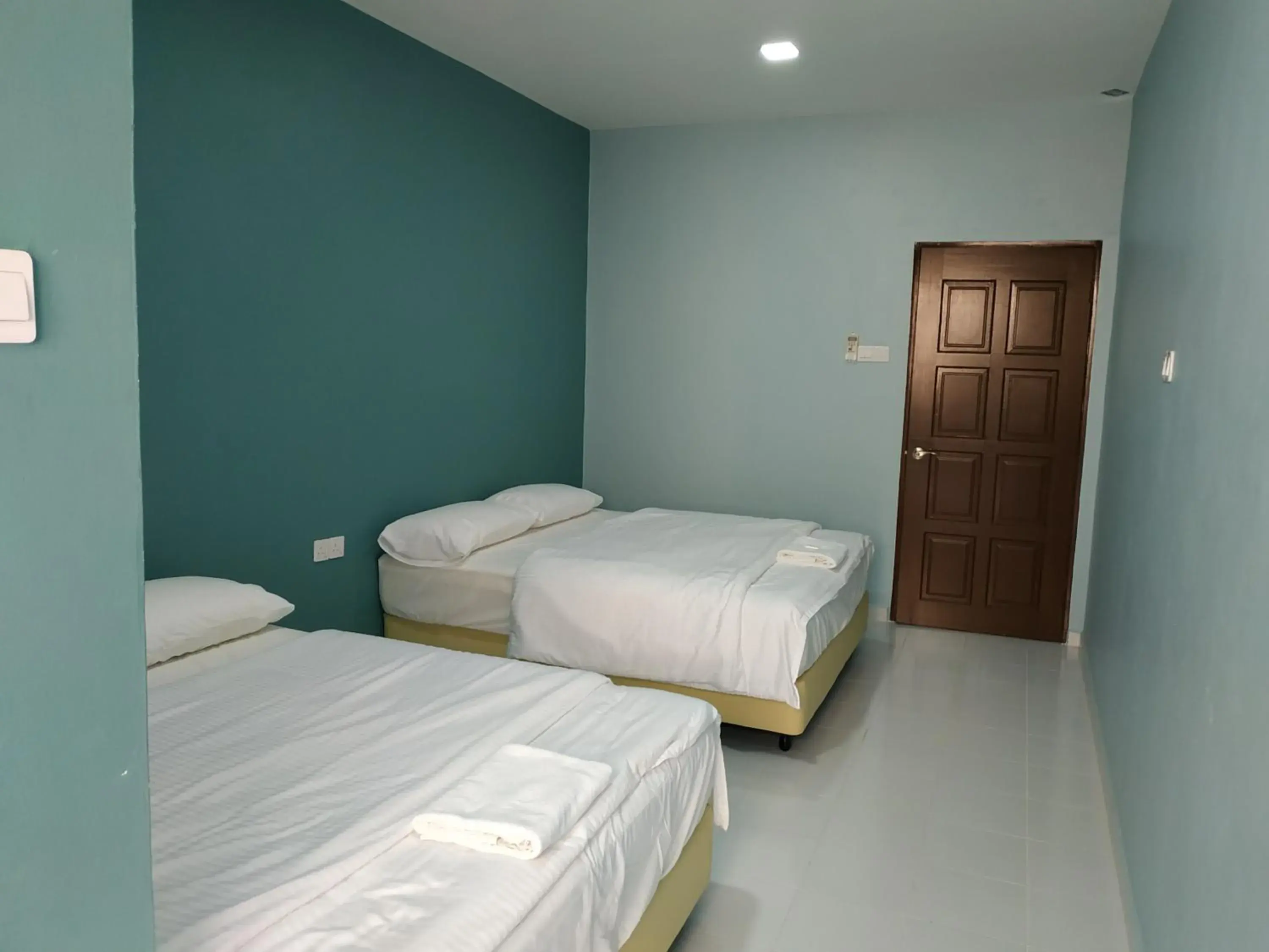 Bed in Qeyjan Hotel Bed in Qeyjan Hotel