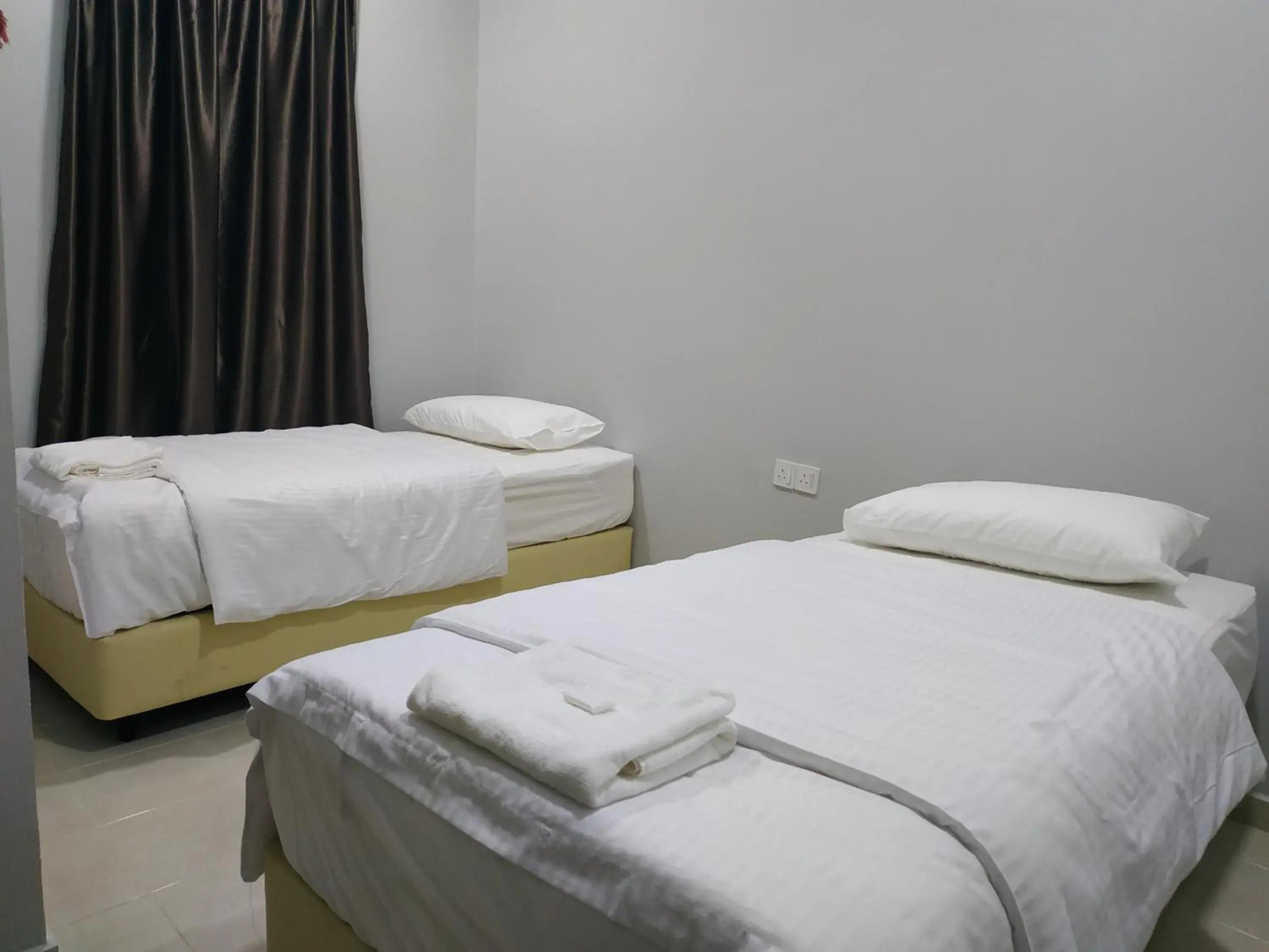 Bed in Qeyjan Hotel Bed in Qeyjan Hotel