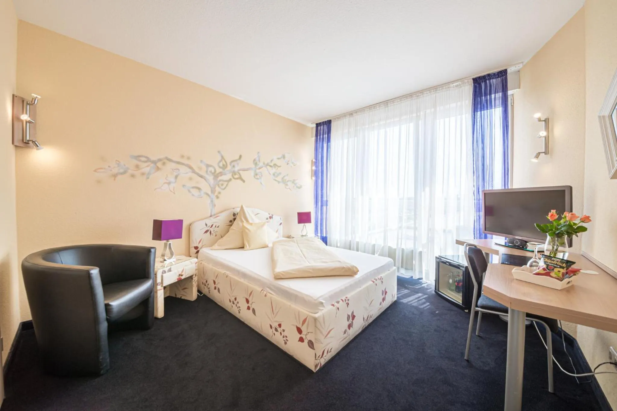 Decorative detail, Bed in Europa Hotel Garni free parking