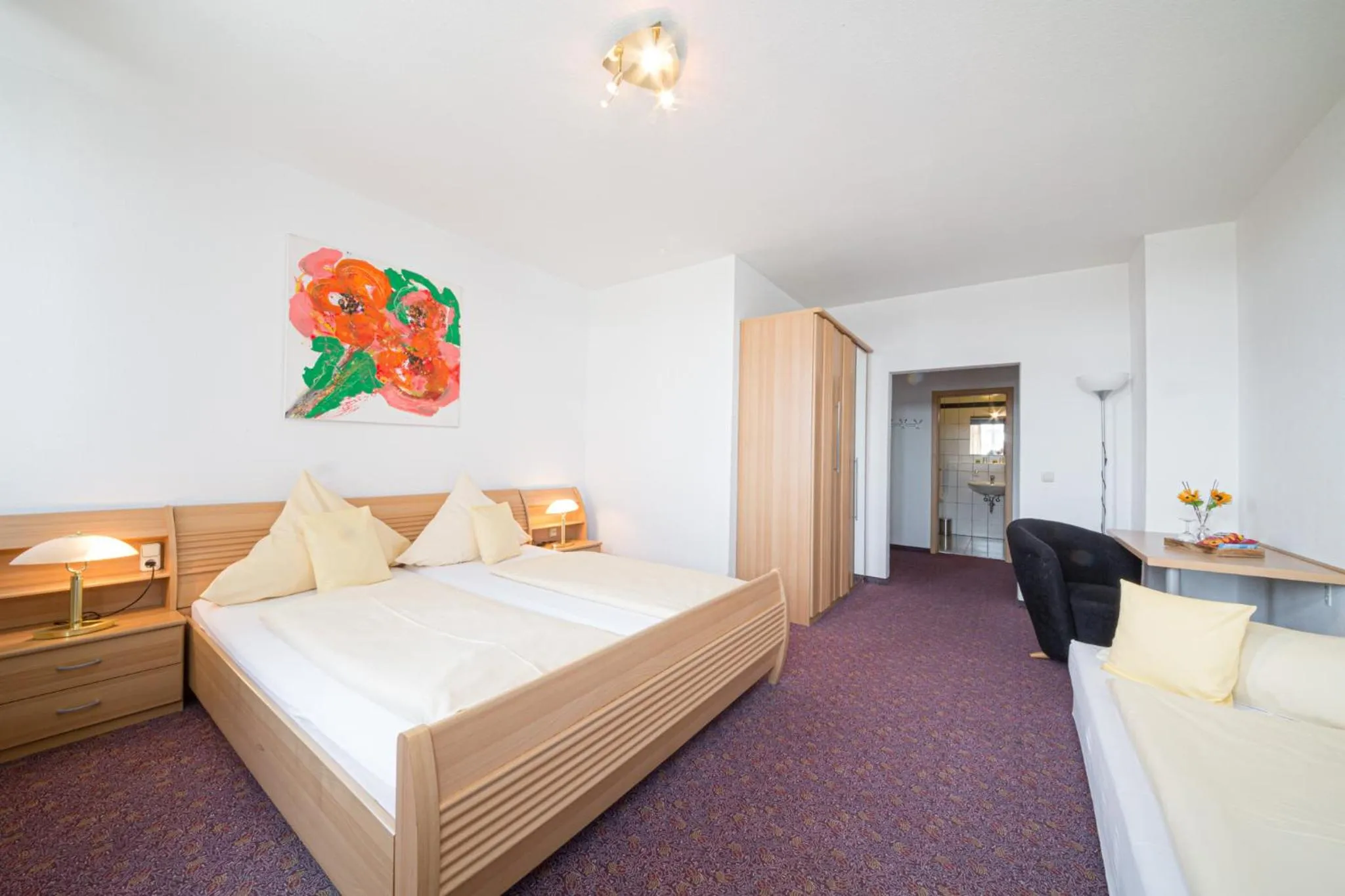 Bedroom, Bed in Europa Hotel Garni free parking