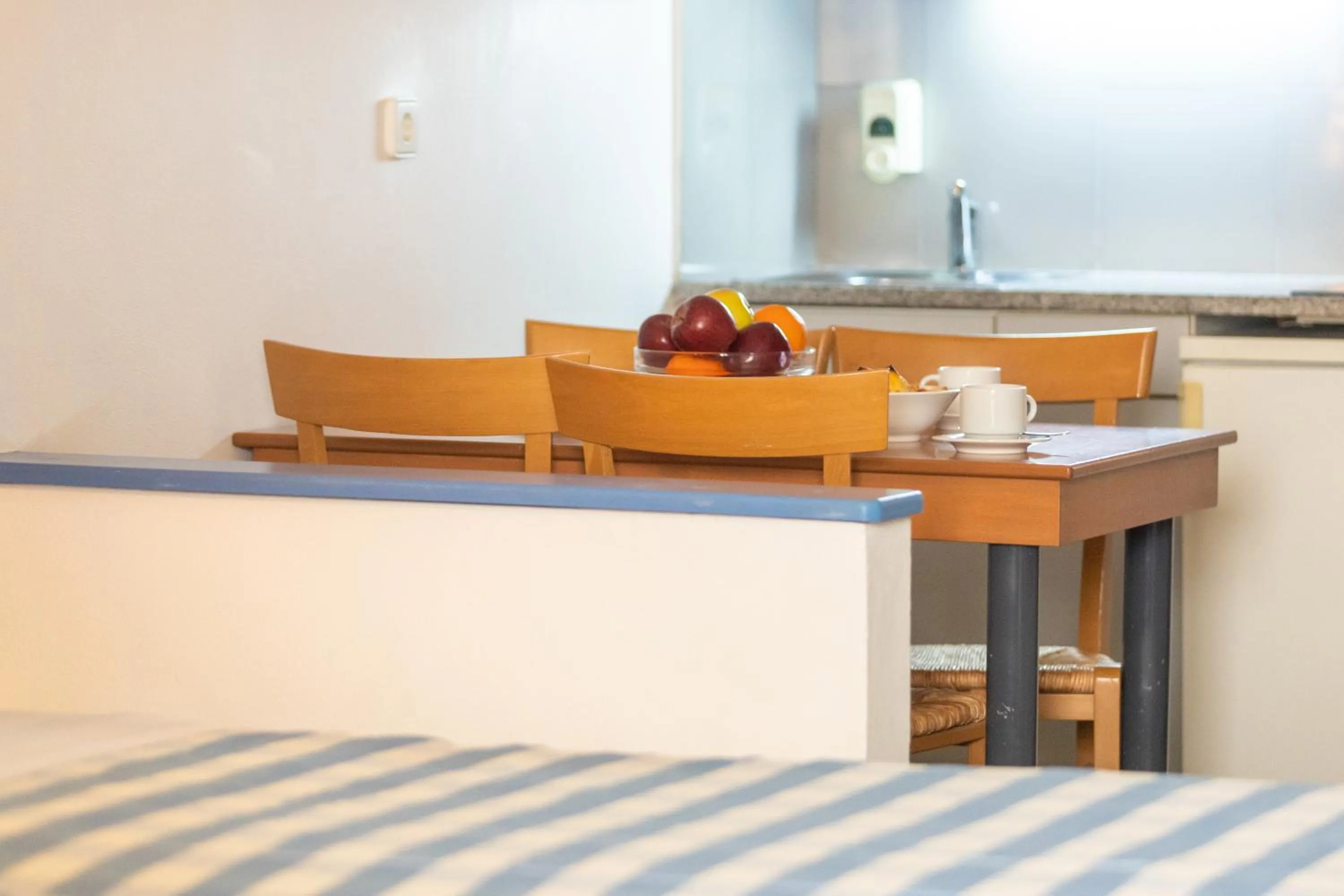 Kitchen or kitchenette in Ibiscos Garden Hotel