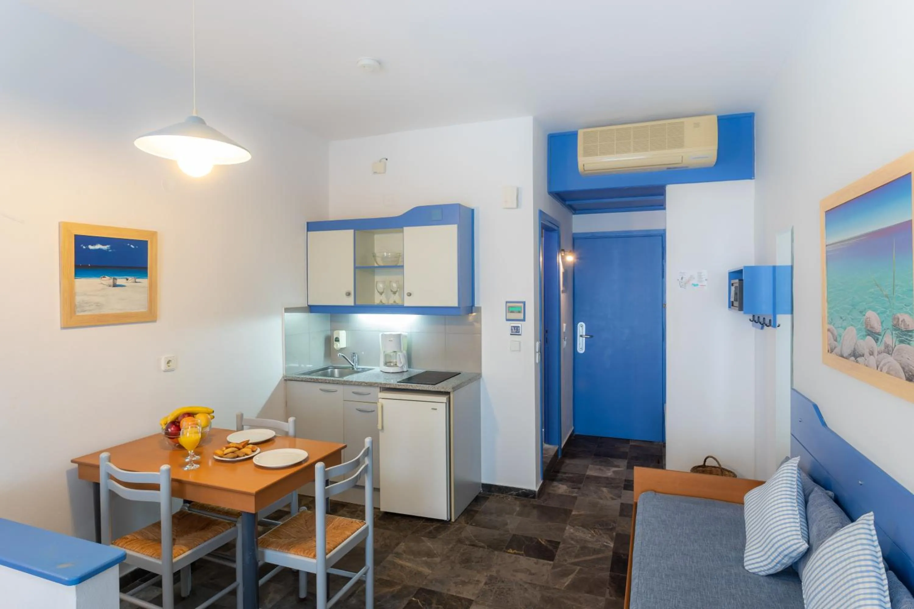 Kitchen or kitchenette in Ibiscos Garden Hotel