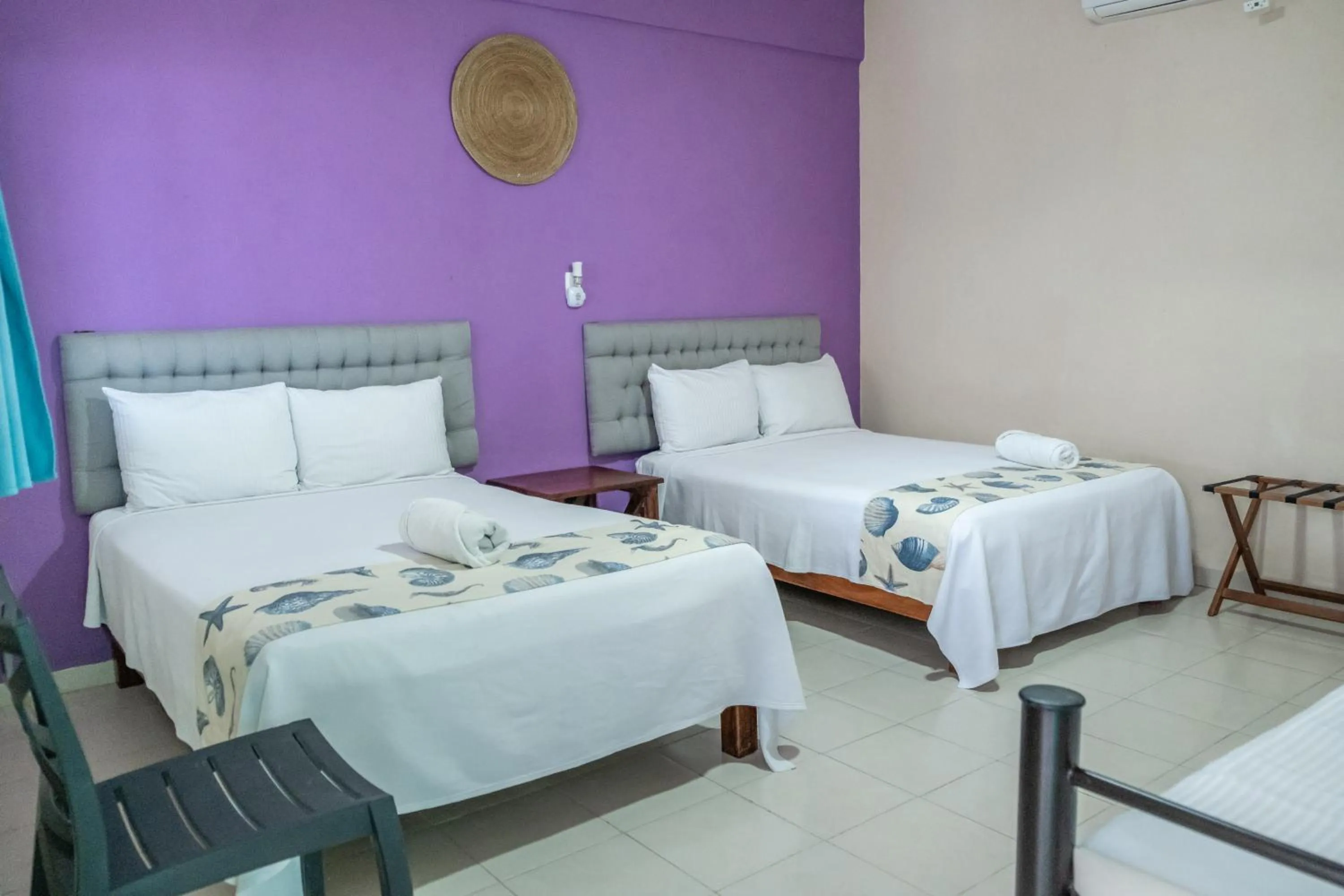 Bed in Hotel Pelicano