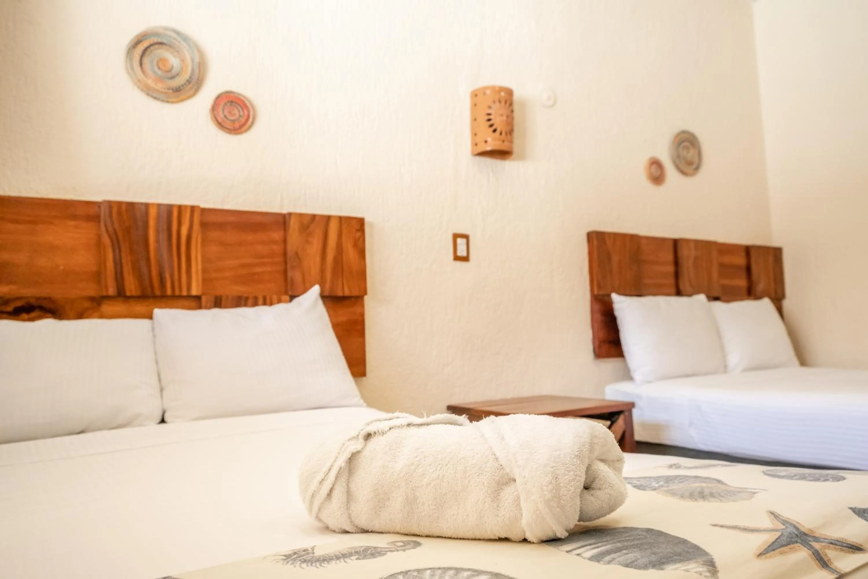 Bed in Hotel Pelicano